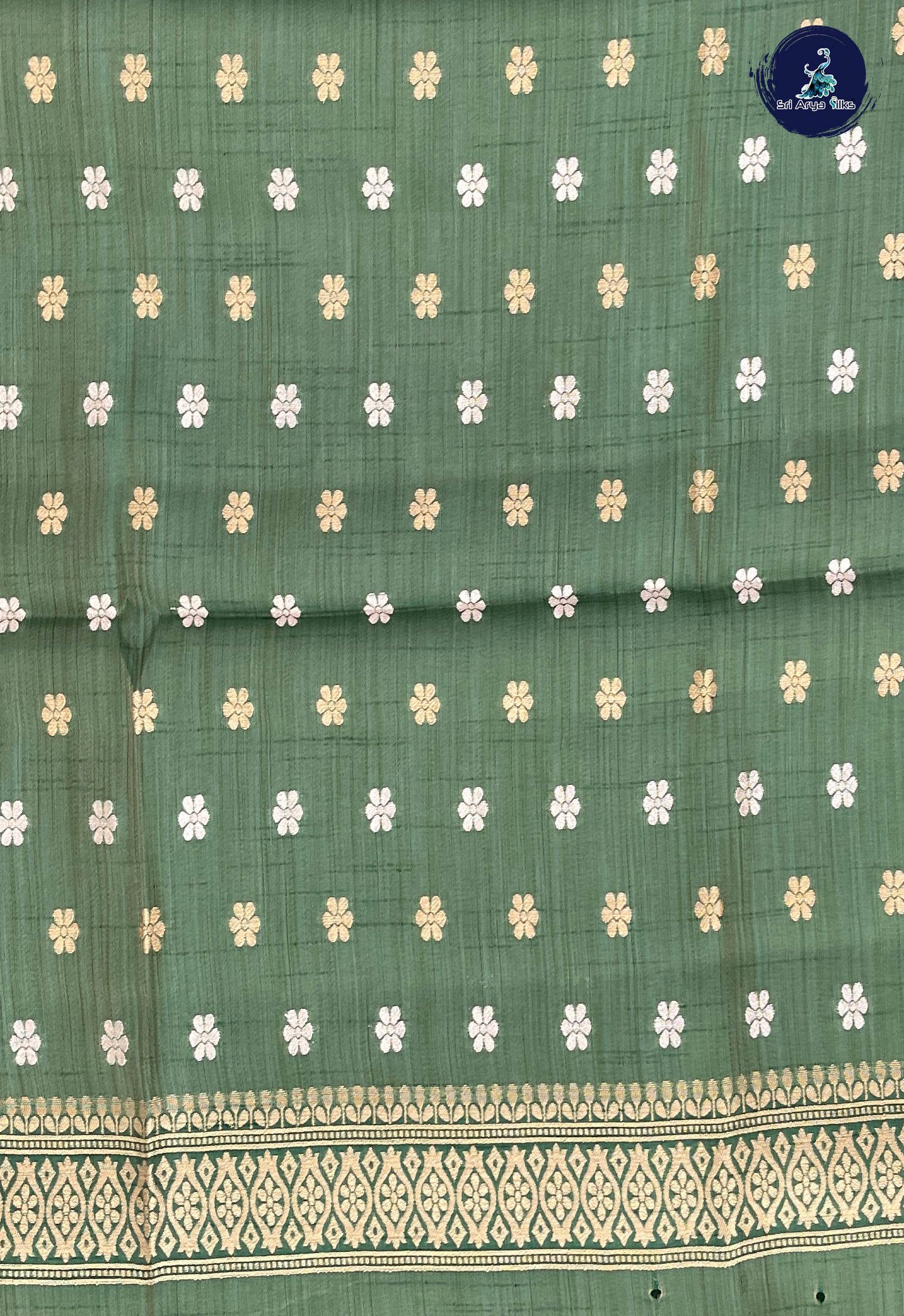 Dark Green Semi Tussar Saree With Embossed Pattern