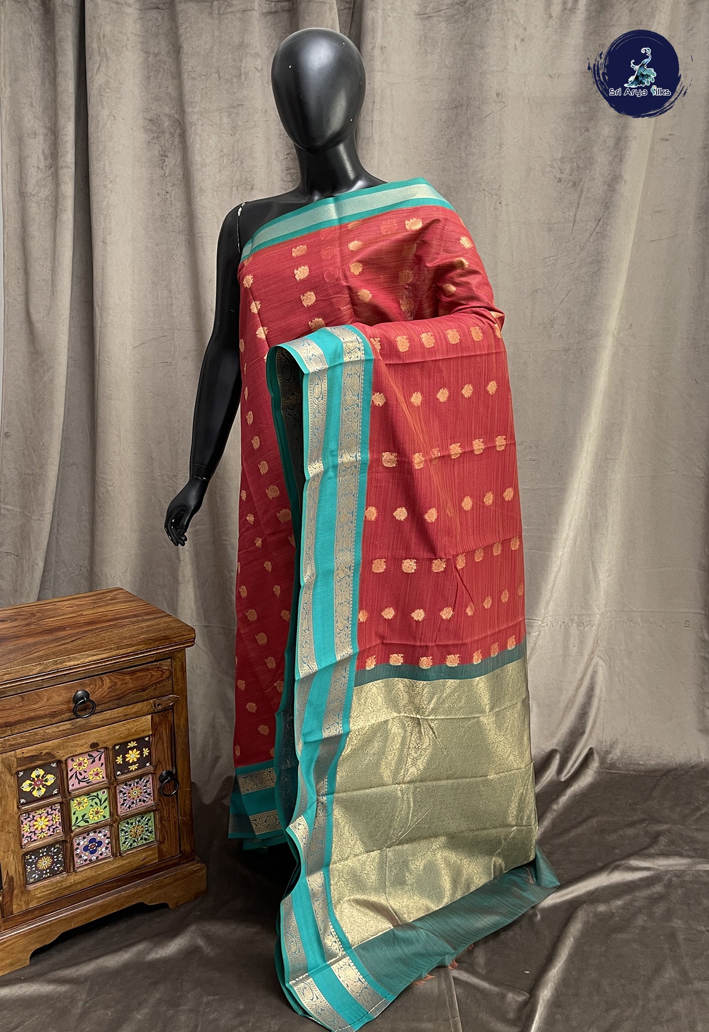 Teracotta Red Semi Silk Cotton Saree With Zari Buttas Pattern