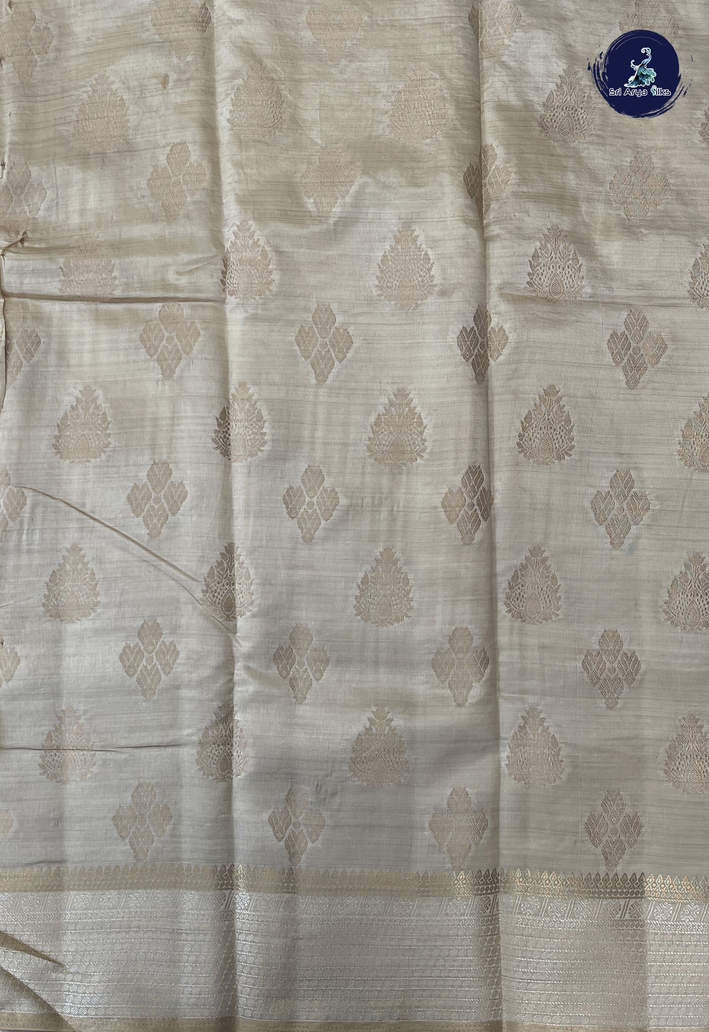Off White Semi Tussar Saree With Zari Buttas Pattern