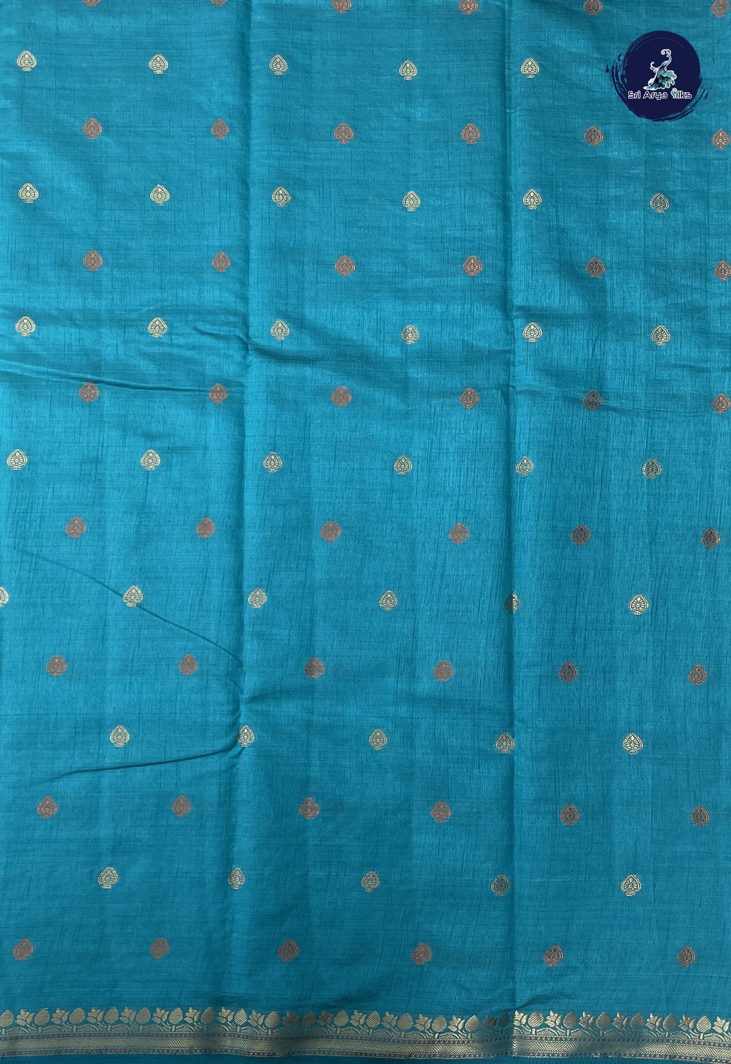 Teal Blue Semi Tussar Saree With Zari Buttas Pattern