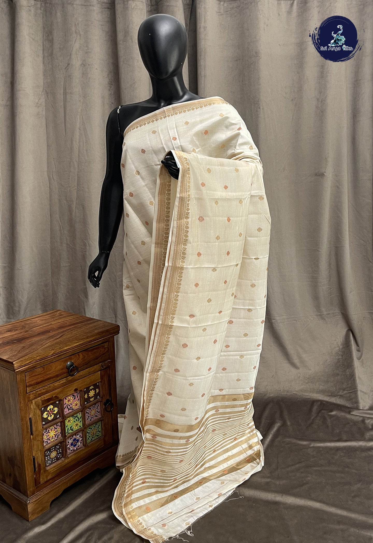 Off White Semi Tussar Saree With Zari Buttas Pattern