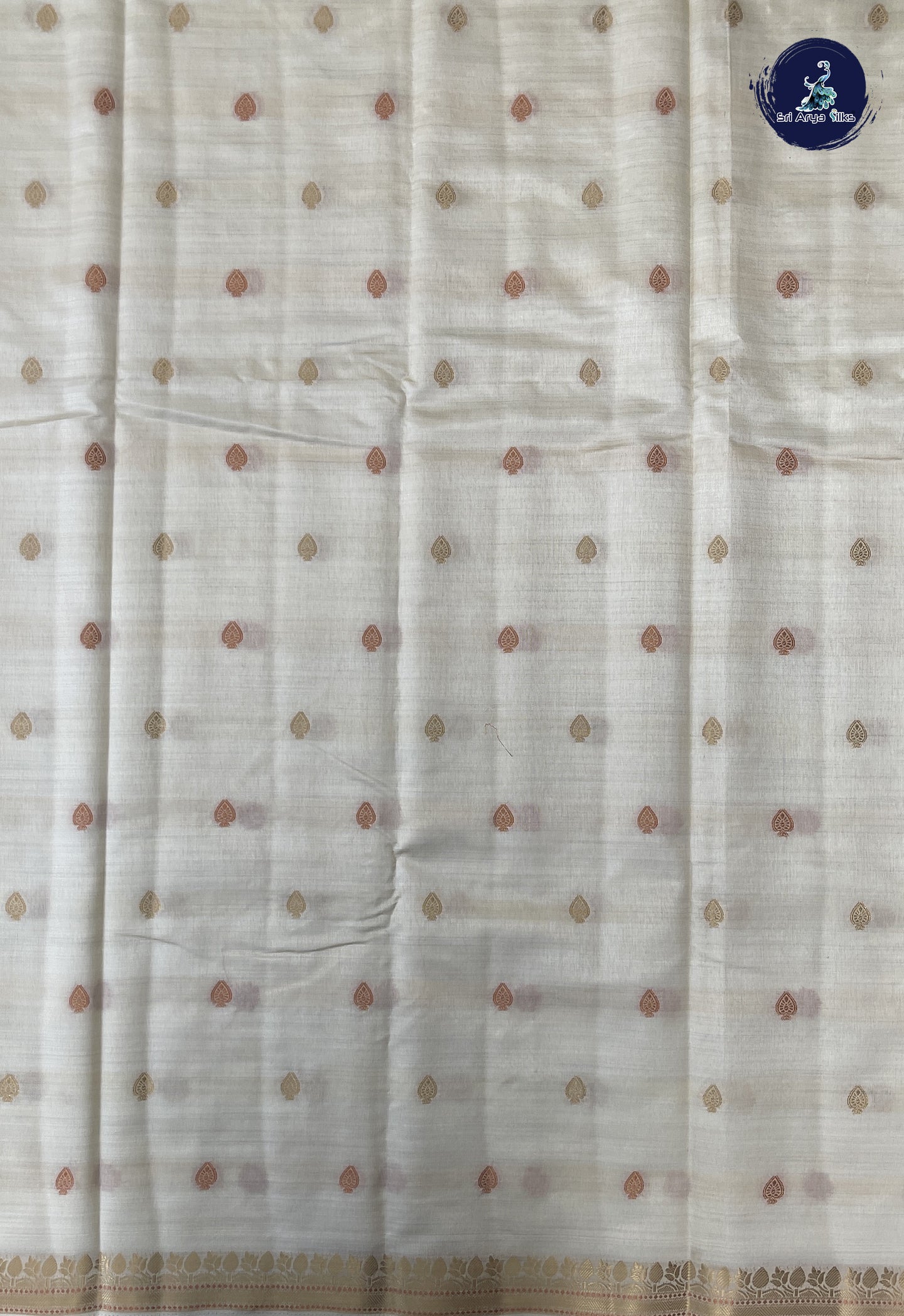 Off White Semi Tussar Saree With Zari Buttas Pattern