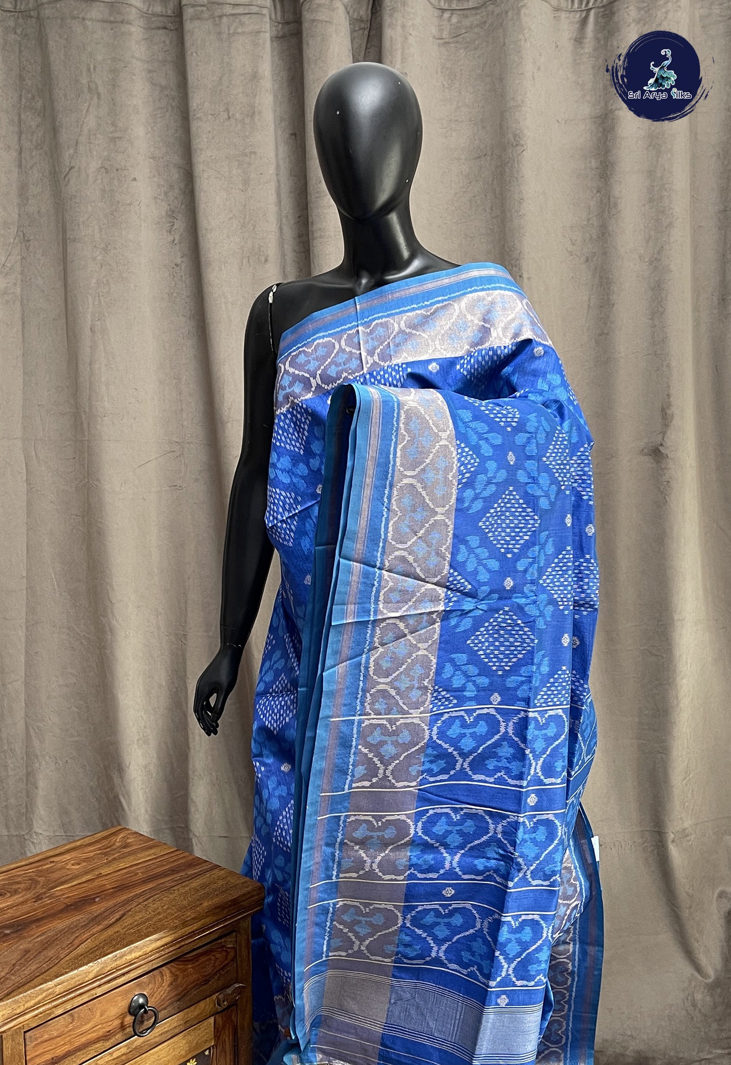 Blue Semi Raw Silk Saree With Ikat Pattern