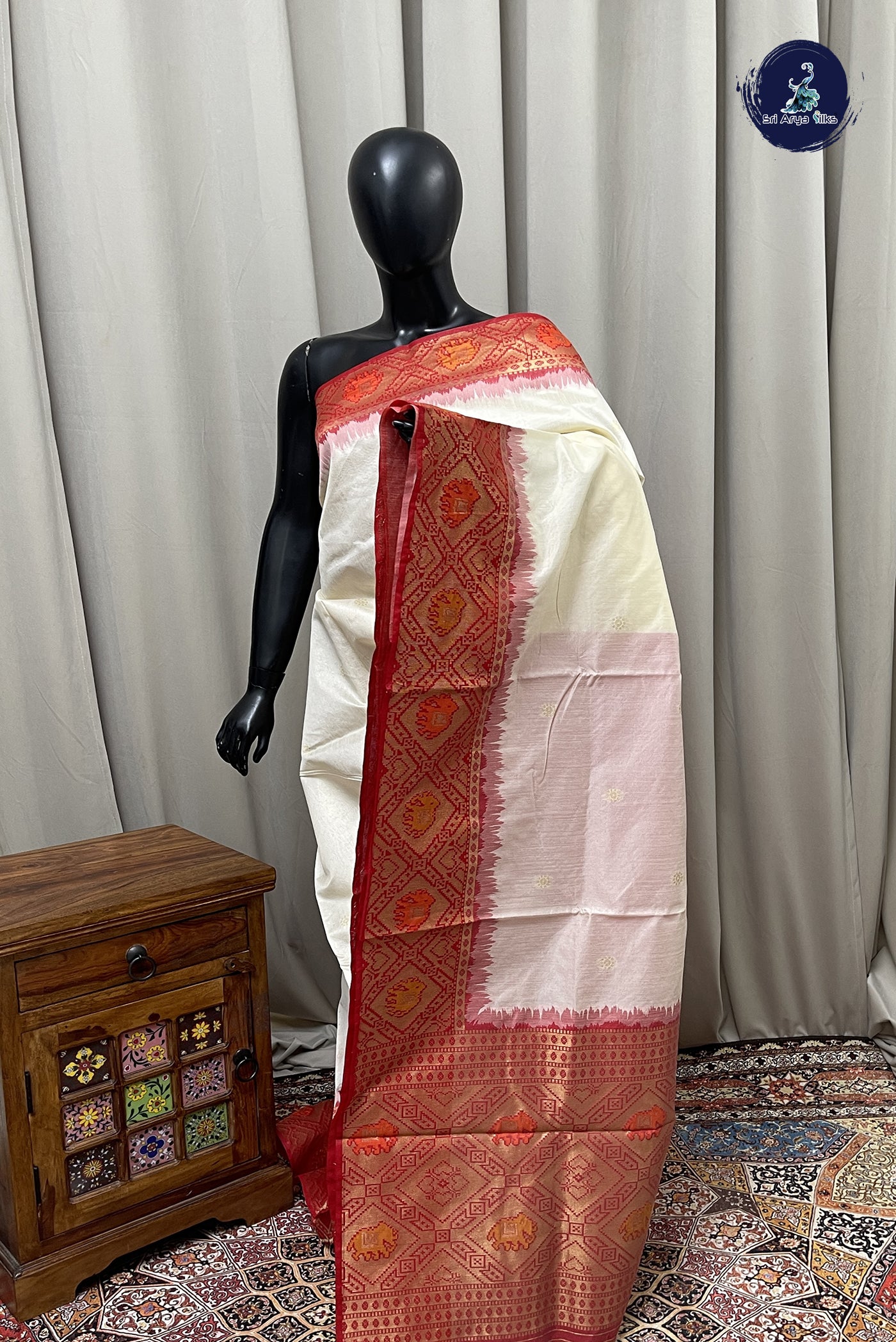 Off White Semi Raw Silk Saree With Zari Buttas Pattern