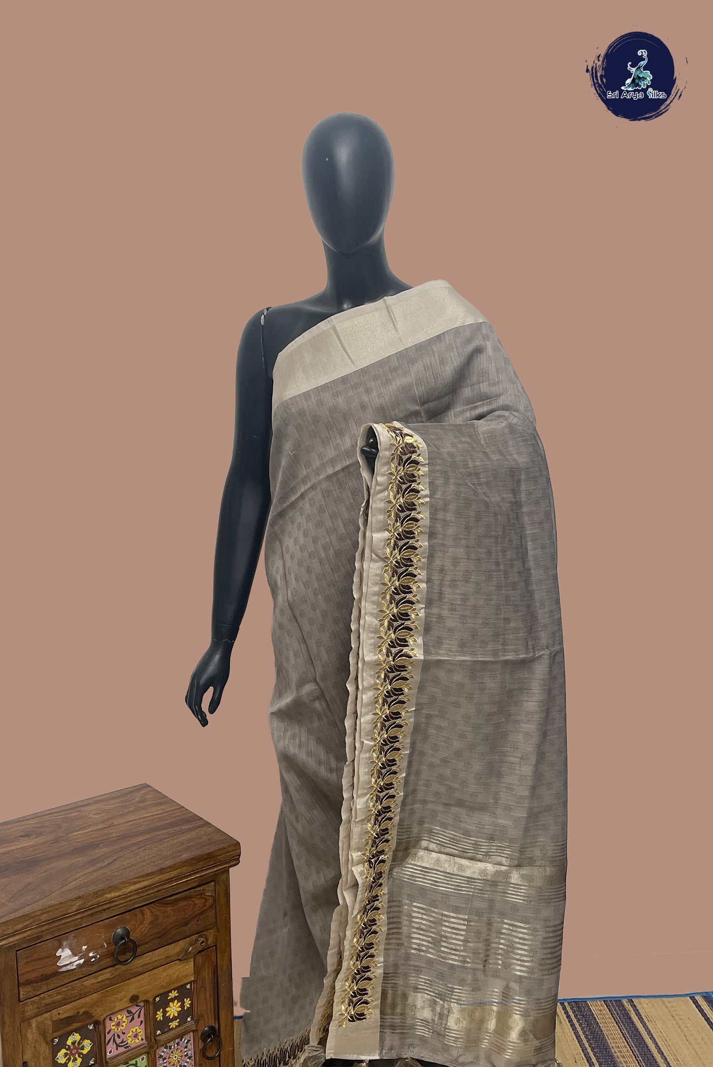 Chocolate Shade Semi Raw Silk Saree With Embossed Pattern