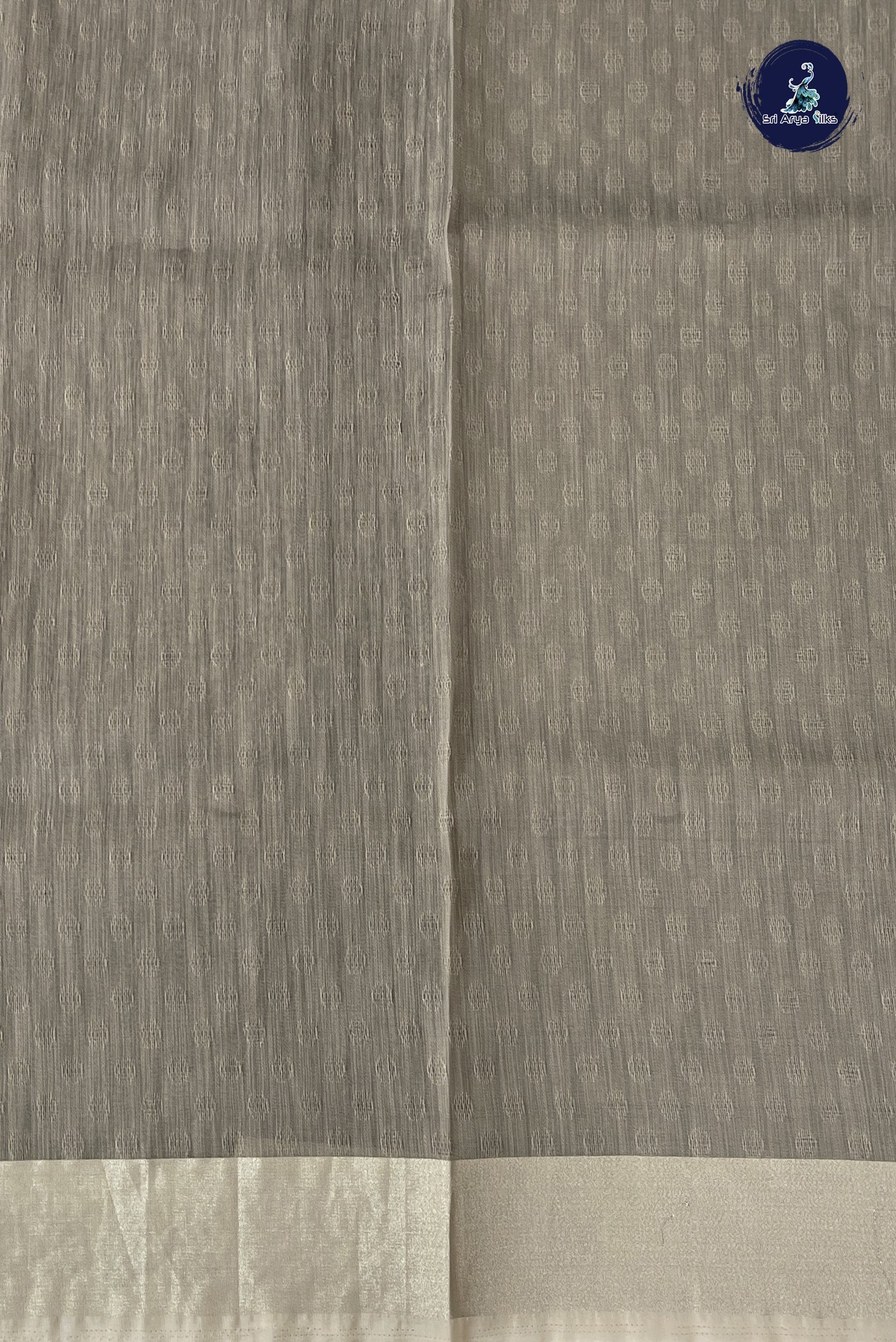 Chocolate Shade Semi Raw Silk Saree With Embossed Pattern