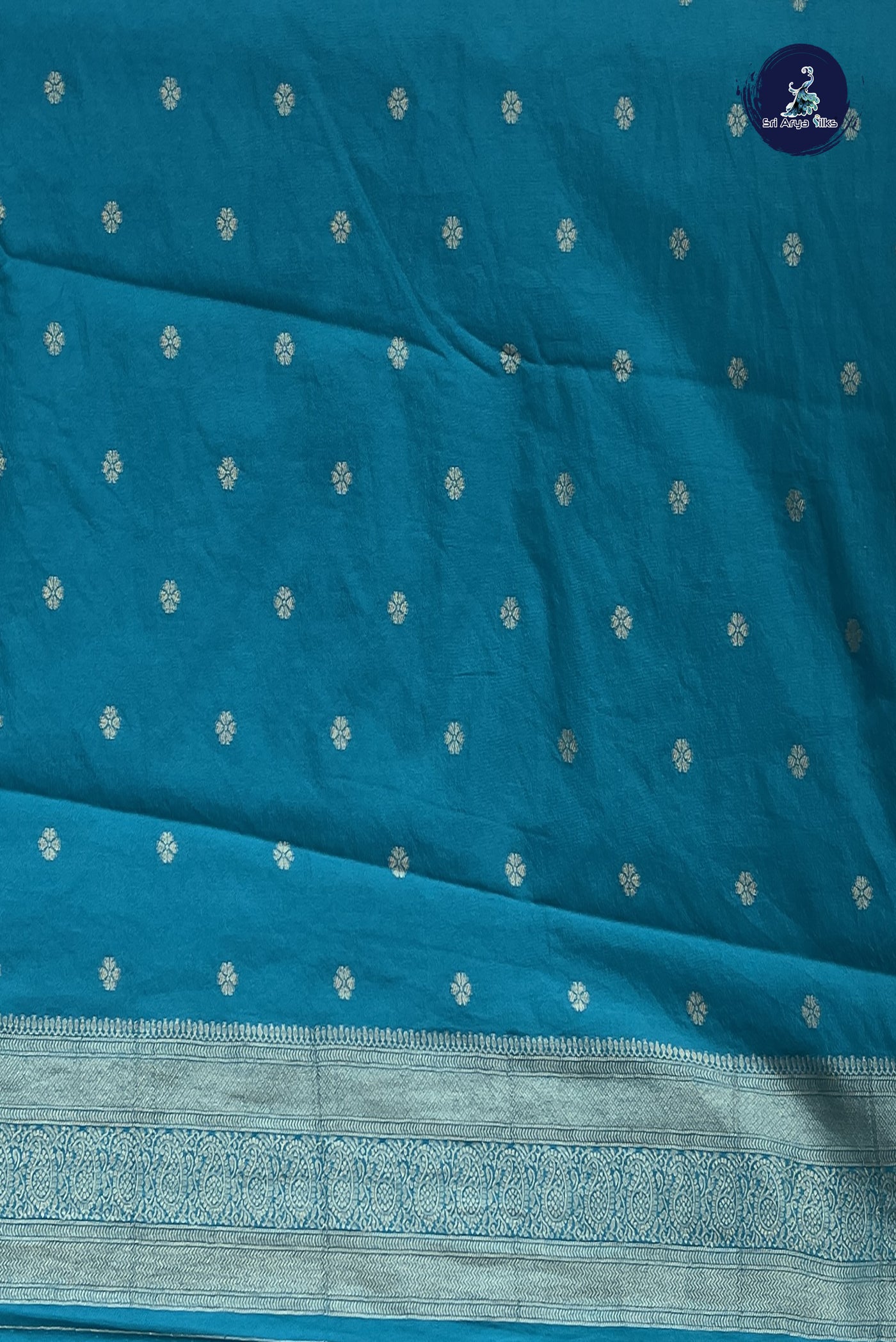 Teal Blue Georgette Banarasi Saree With Zari Buttas Pattern