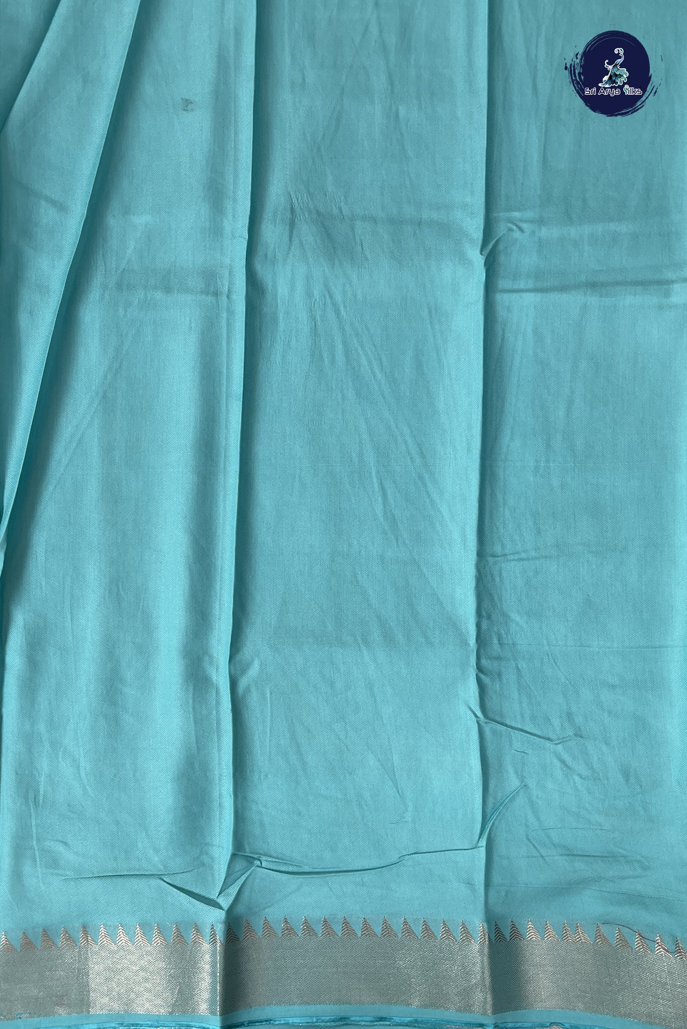 Light Blue Semi Tussar Saree With Embossed Pattern