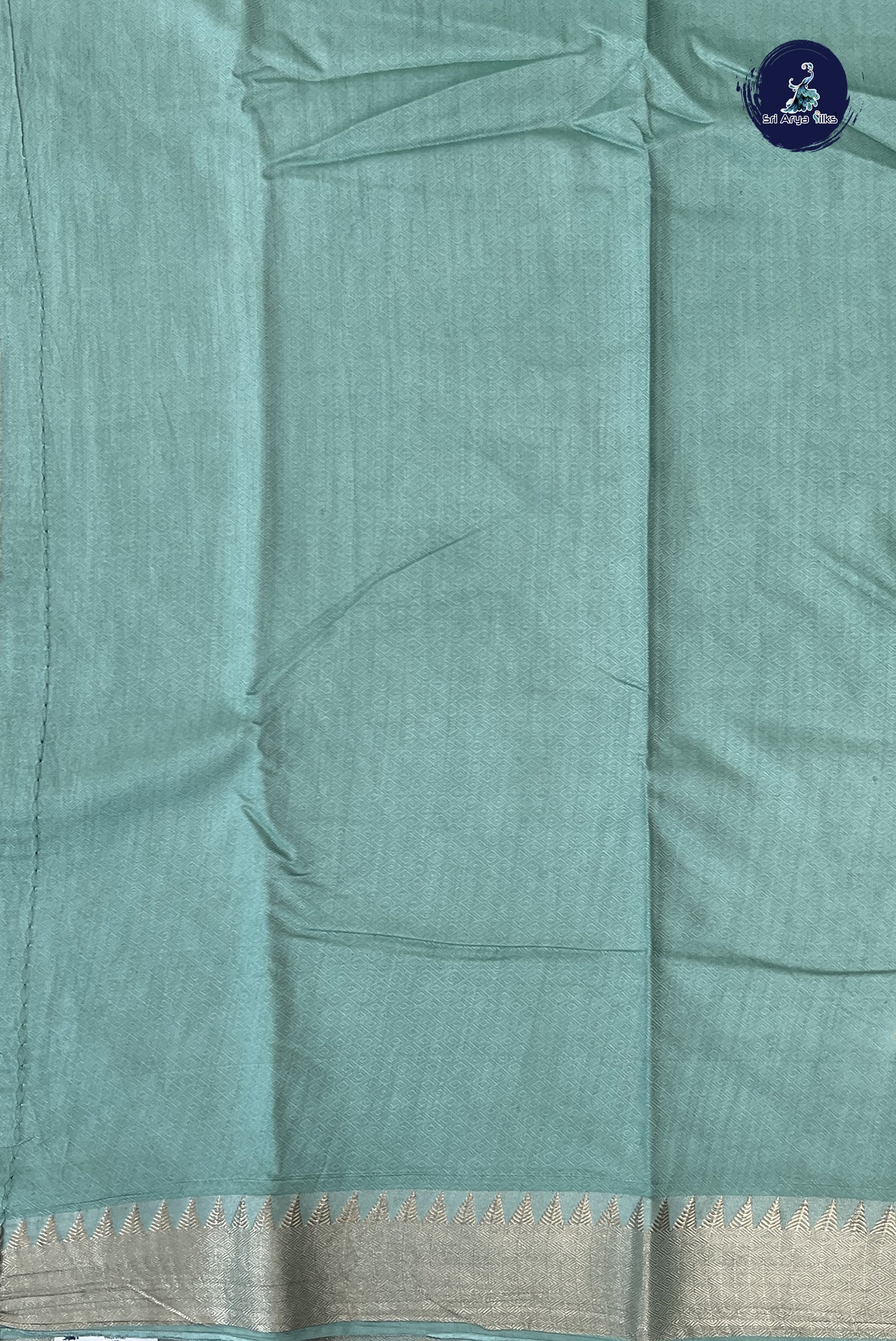 Pastel Shade Semi Tussar Saree With Embossed Pattern