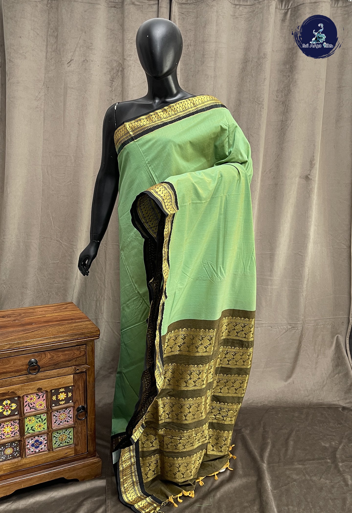 Pastel Green Semi silk cotton saree with plain pattern