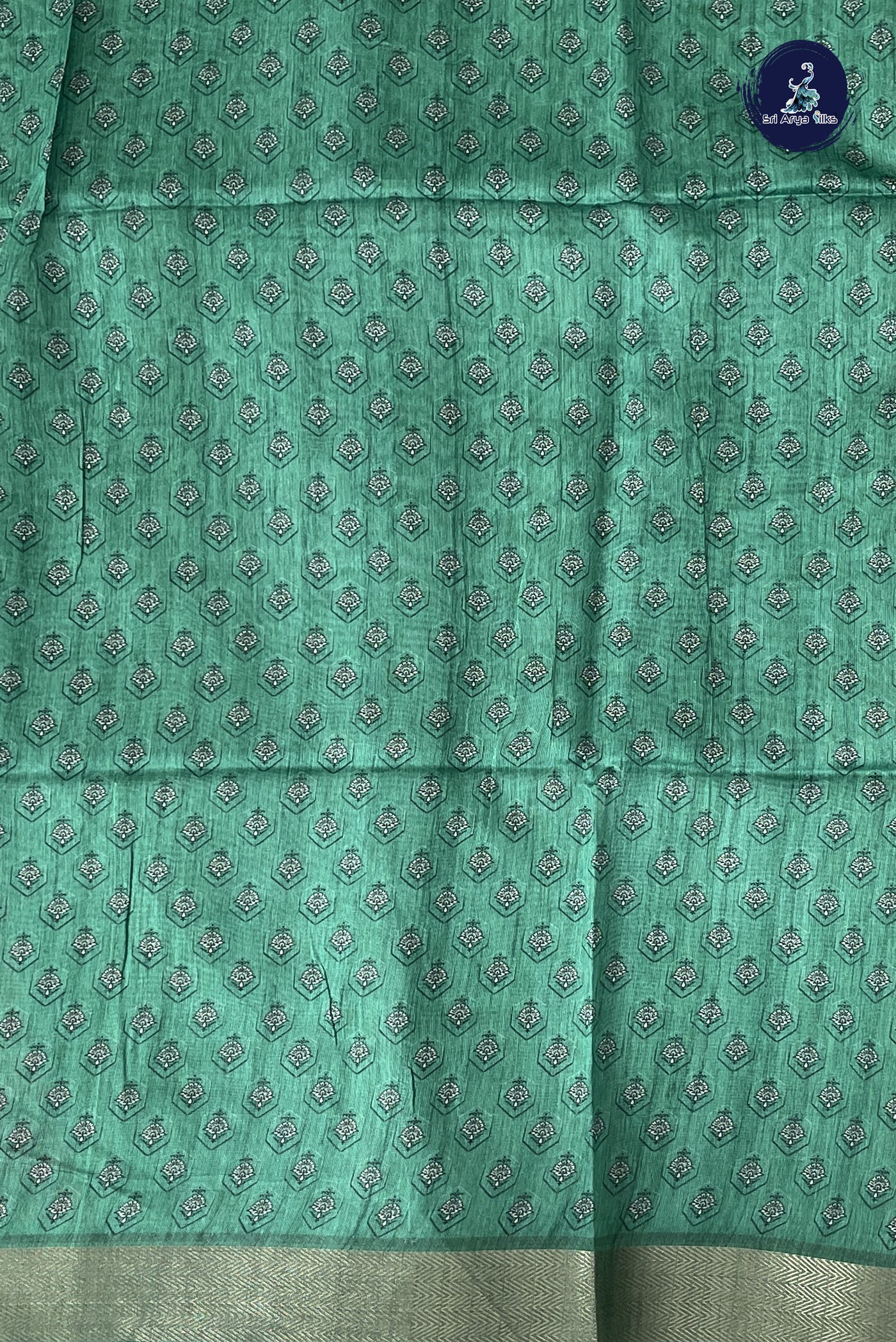 Chikku Shade Semi Chanderi Saree With Printed Pattern