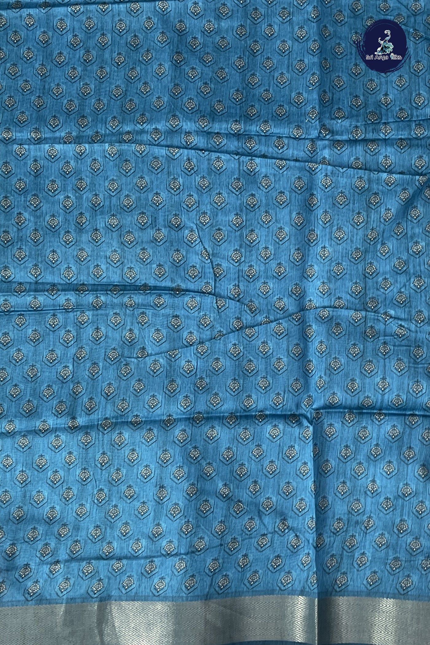 Chikku Shade Semi Chanderi Saree With Printed Pattern
