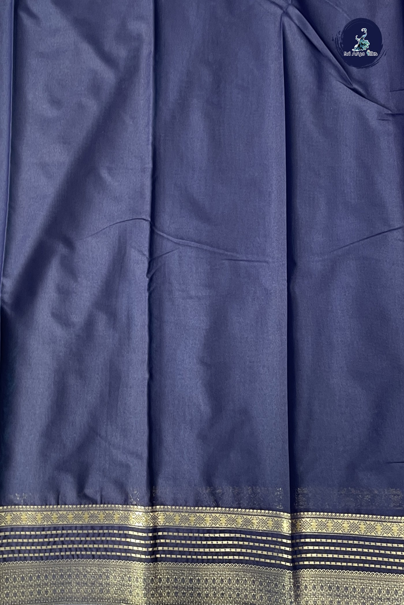 Peacock Blue Semi Mysore Silk With Plain Pattern