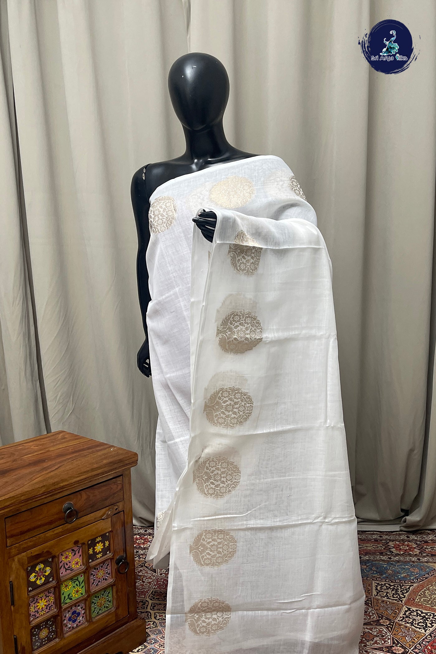 White Linen Saree With Buttas Pattern