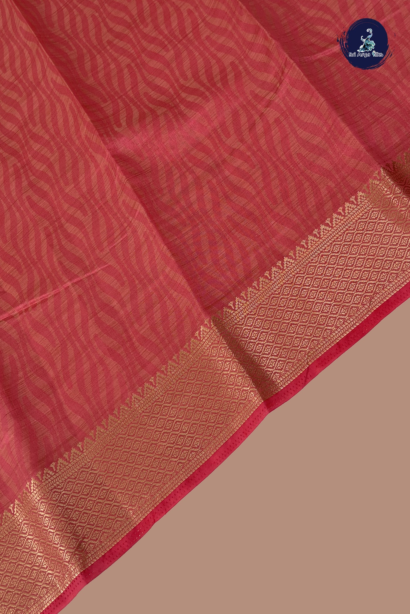 Peach Pink Semi Tussar Saree With Embossed Pattern