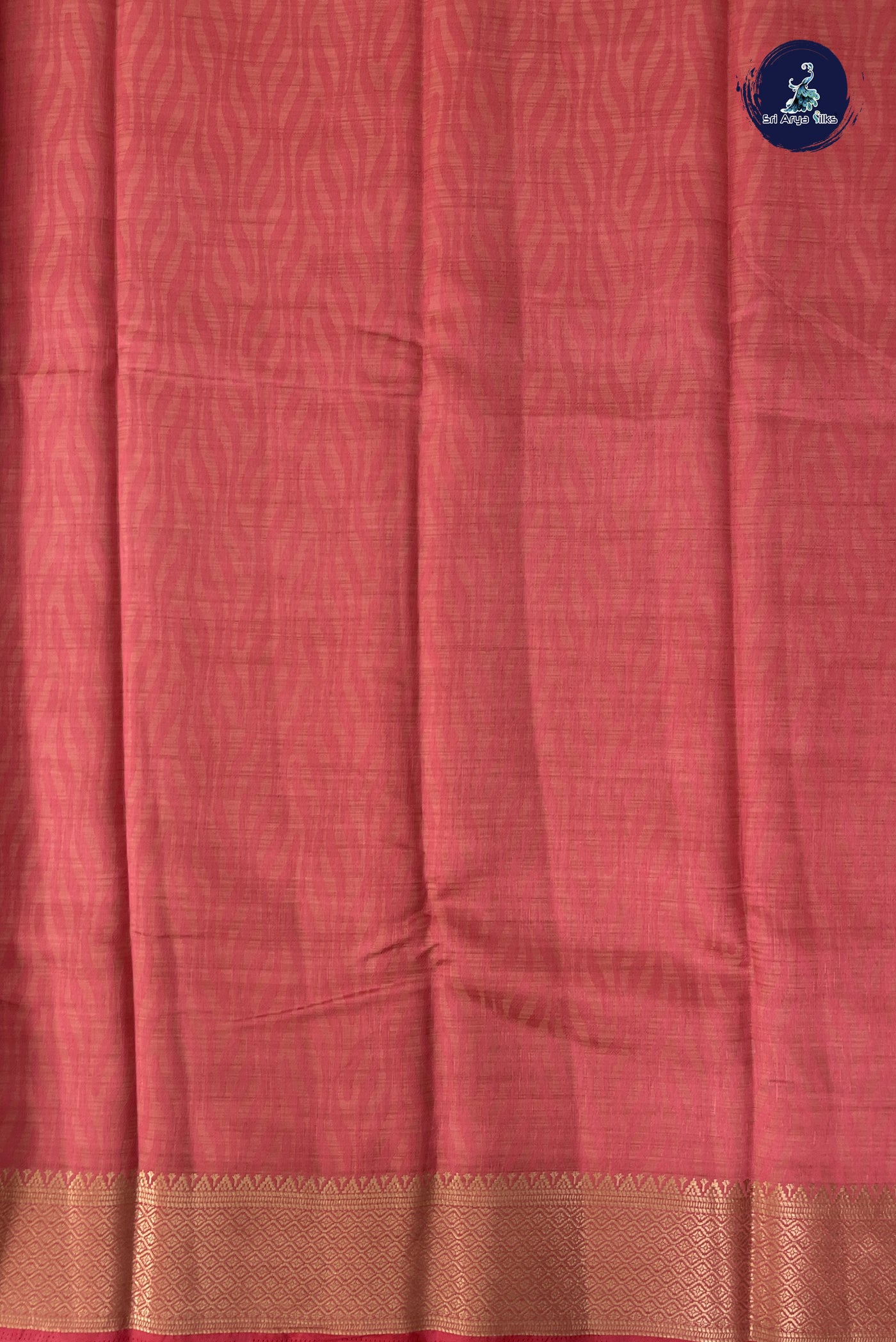 Peach Pink Semi Tussar Saree With Embossed Pattern