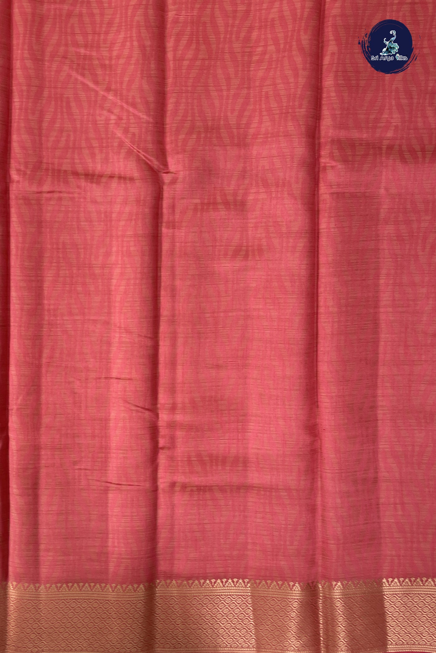 Peach Pink Semi Tussar Saree With Embossed Pattern