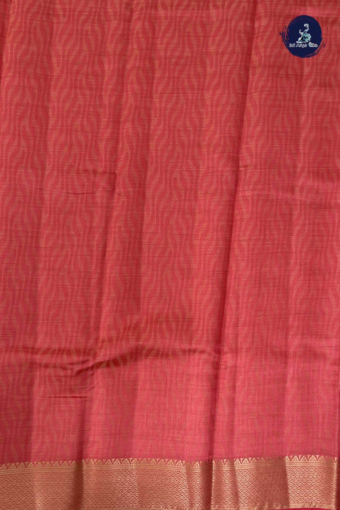 Peach Pink Semi Tussar Saree With Embossed Pattern