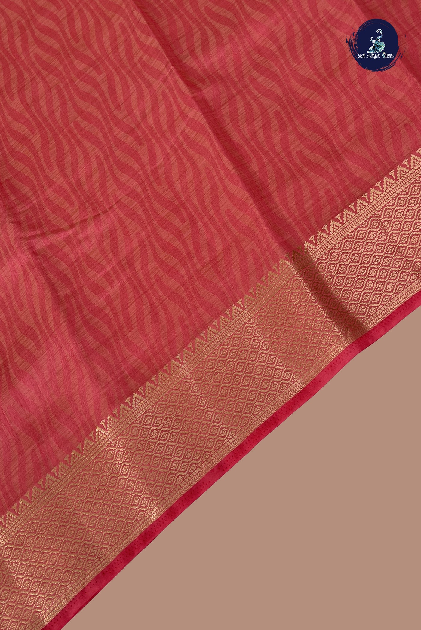Peach Pink Semi Tussar Saree With Embossed Pattern