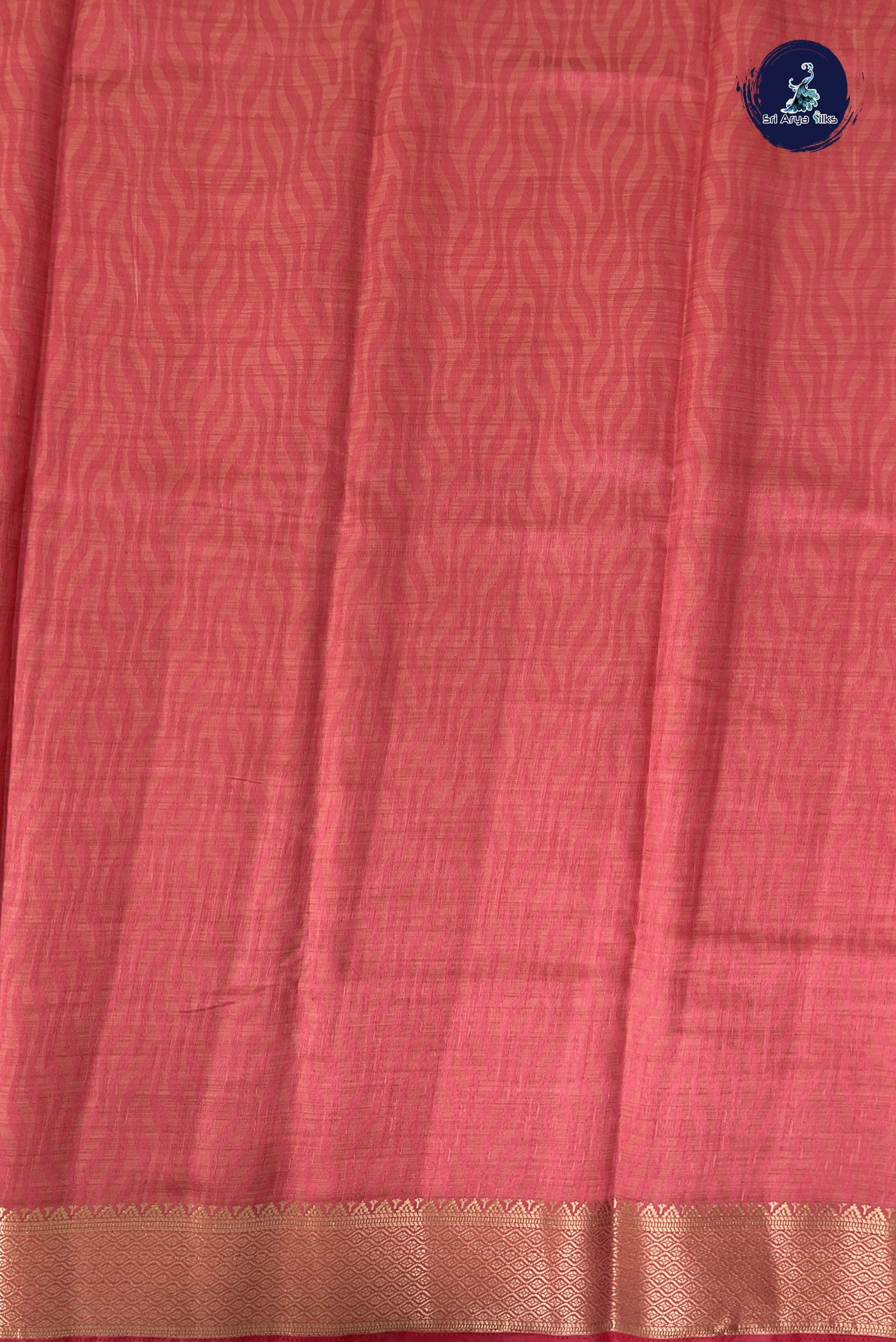Peach Pink Semi Tussar Saree With Embossed Pattern