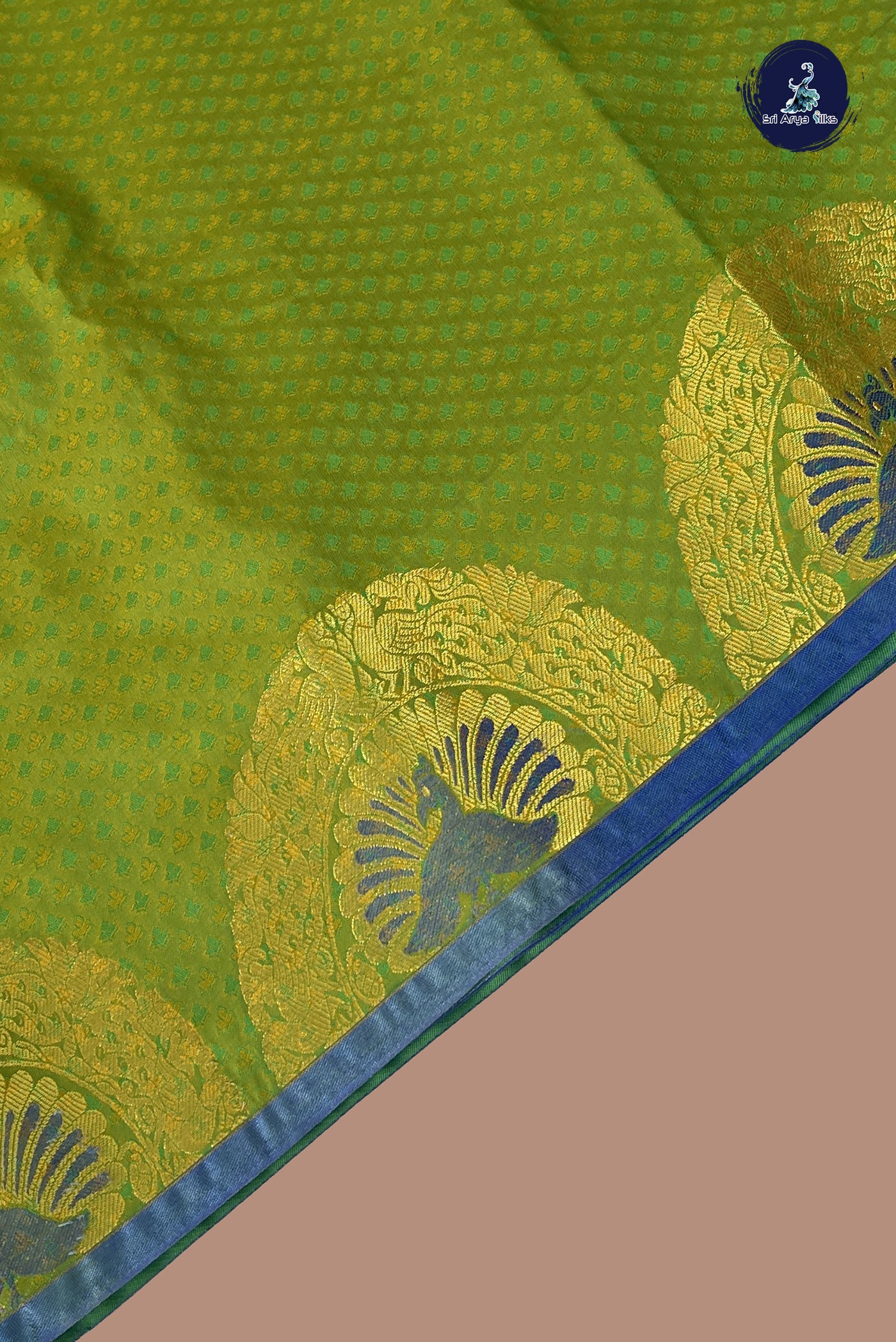 Green Semi silk saree with embossed pattern