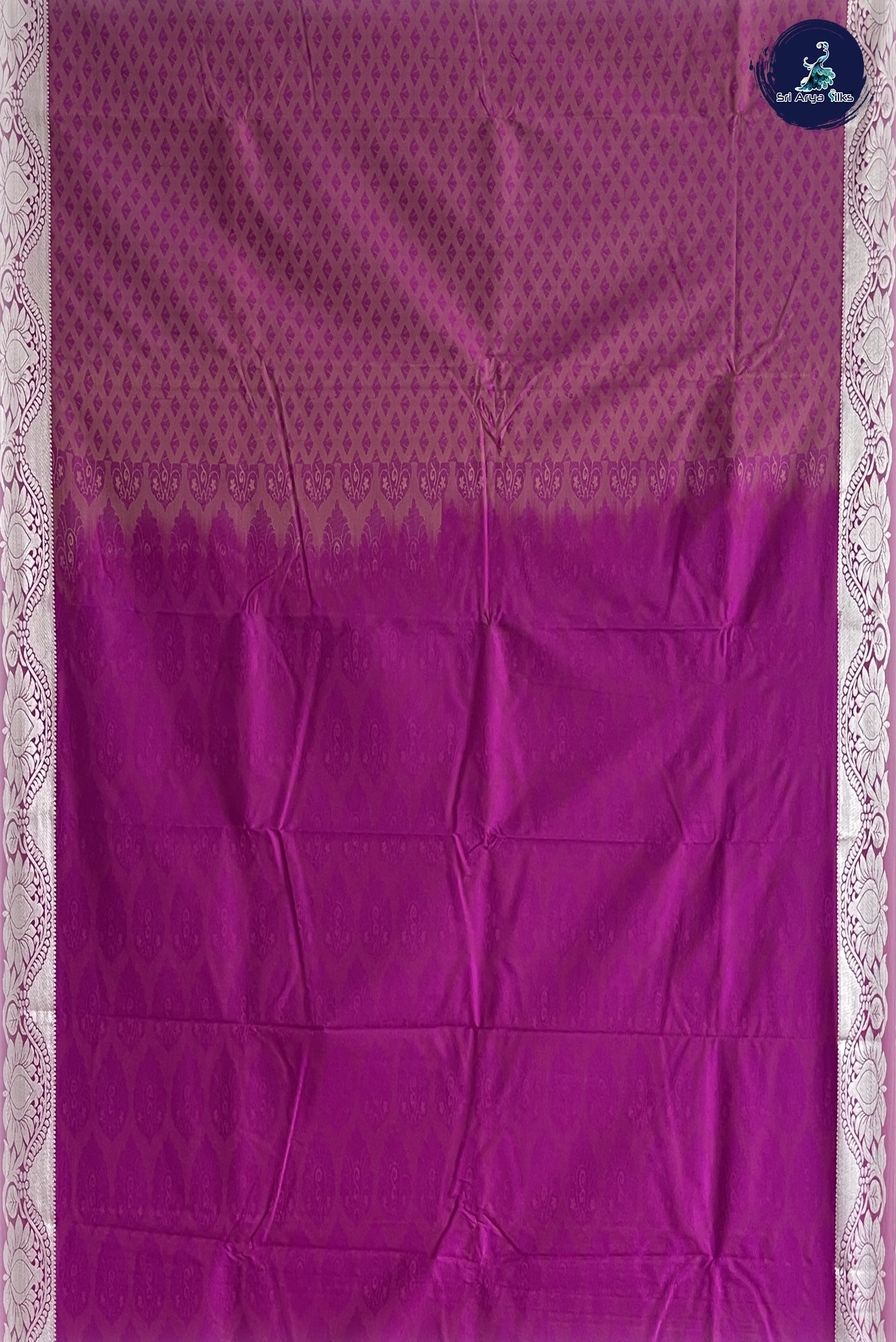 Purple Semi Silk Saree With Embossed Pattern