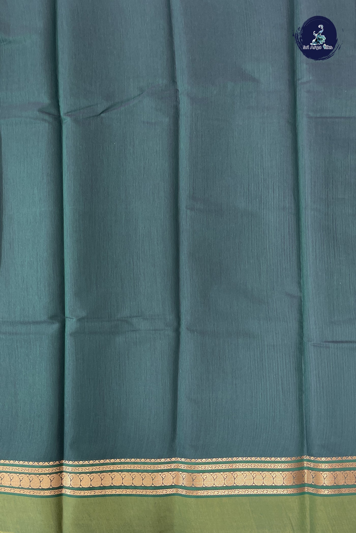 Bottle Green Budget Semi Silk Cotton Saree With Plain Pattern