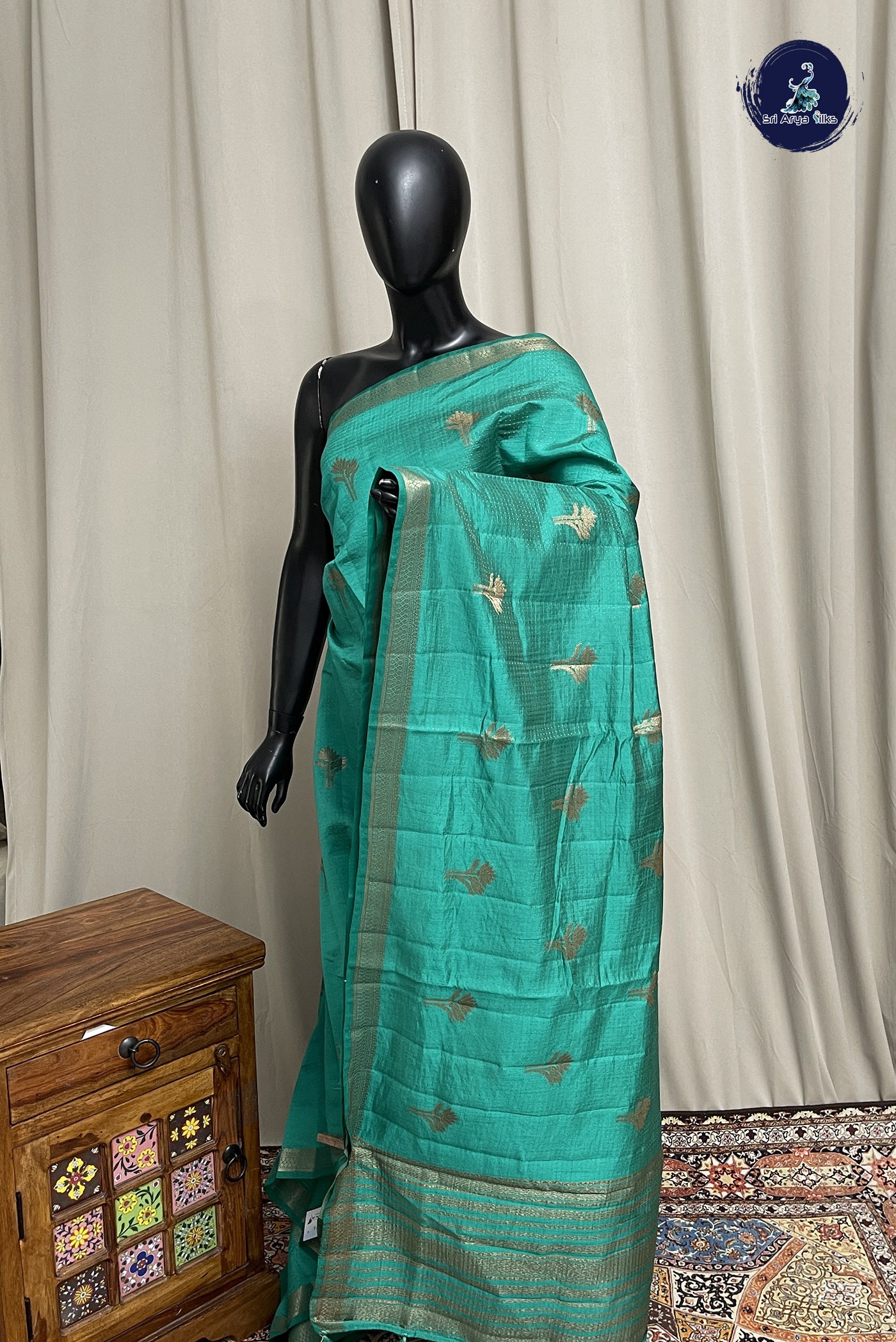 Teal Semi Tussar Saree With Zari Buttas Pattern