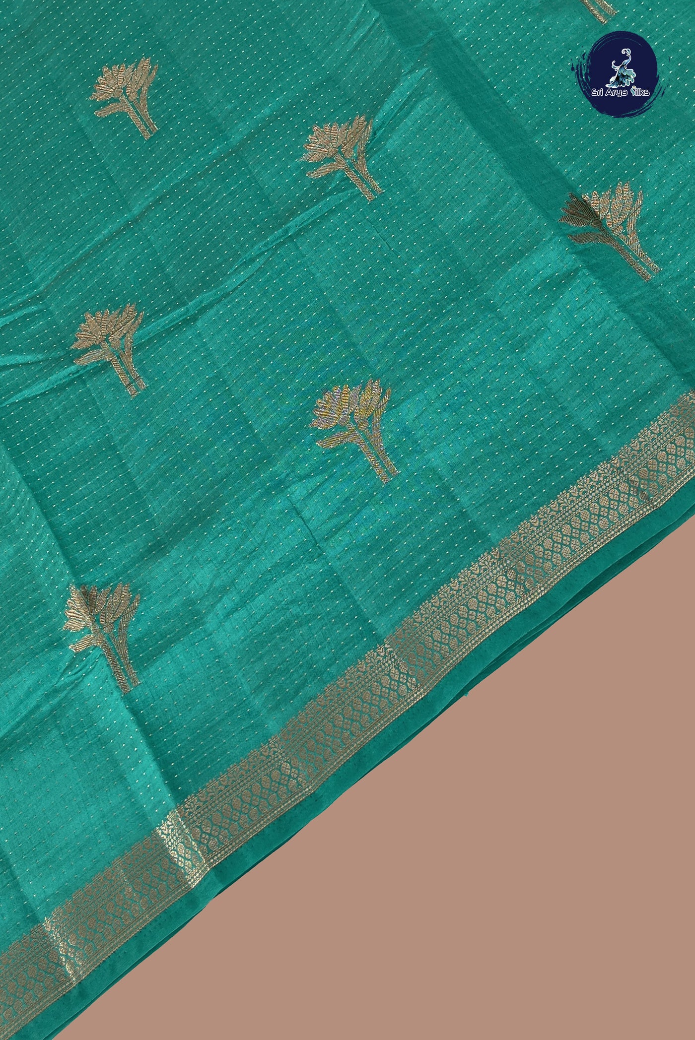 Teal Semi Tussar Saree With Zari Buttas Pattern