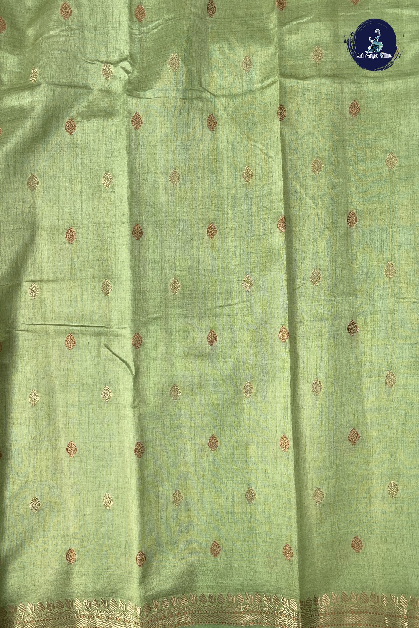 Pista Green Semi Tussar Saree With Zari Buttas Pattern