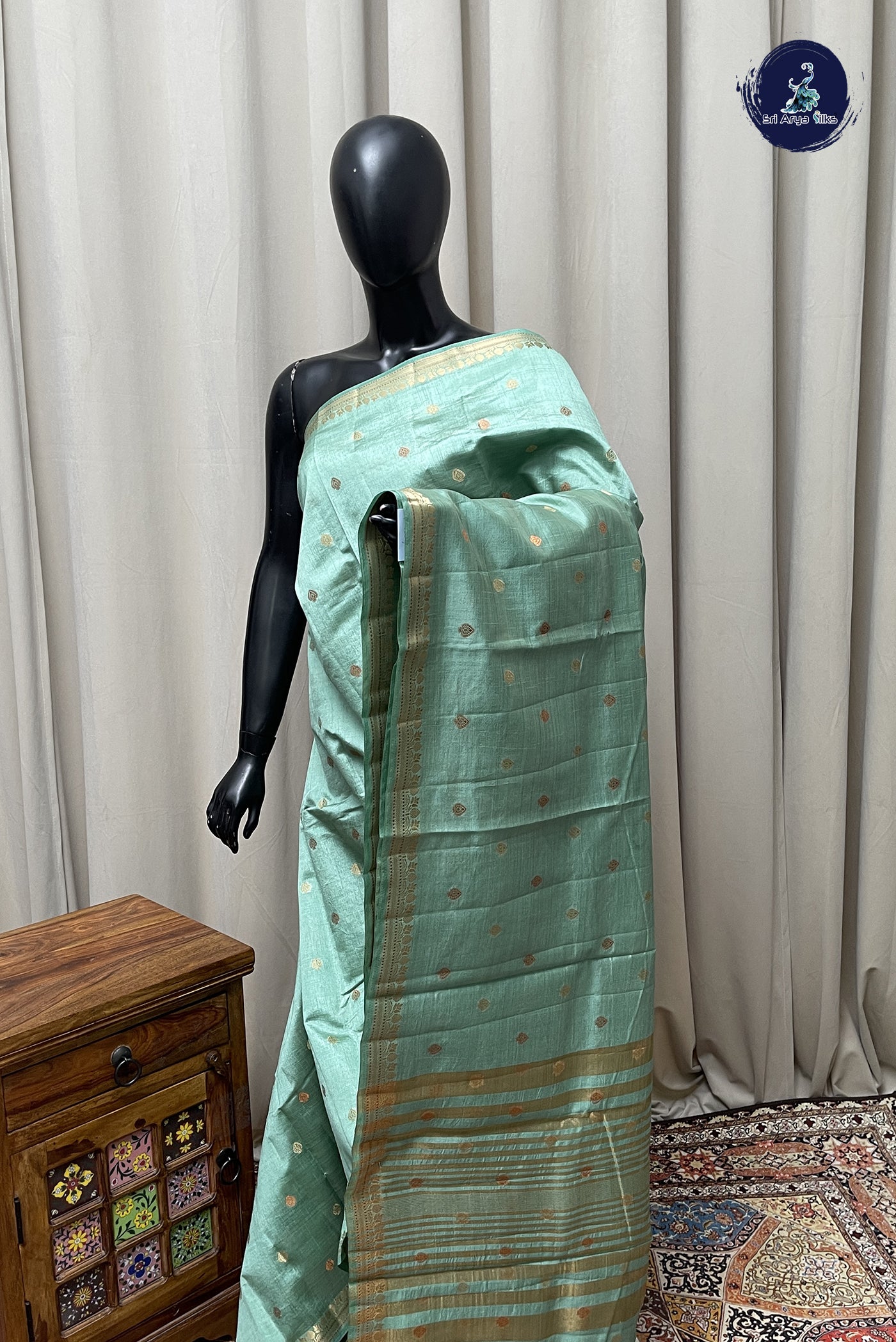 Pastel Green Semi Tussar Saree With Zari Buttas Pattern