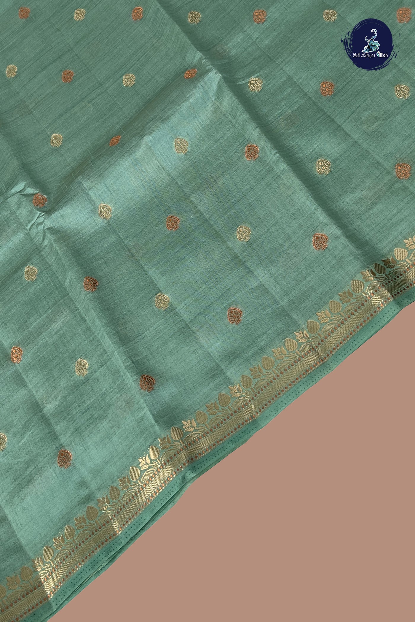 Pastel Green Semi Tussar Saree With Zari Buttas Pattern
