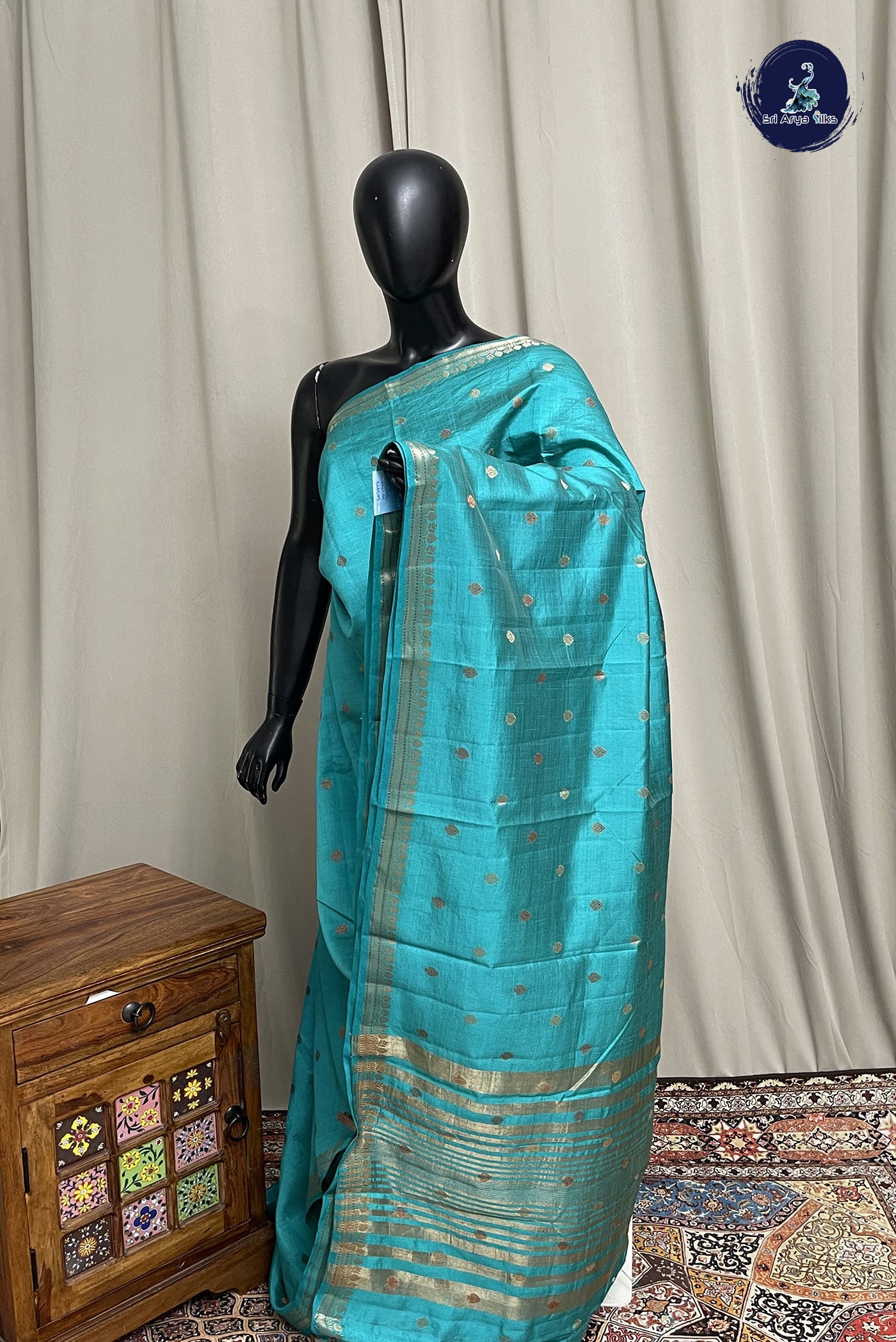 Turquoise Semi Tussar Saree With Zari Buttas Pattern