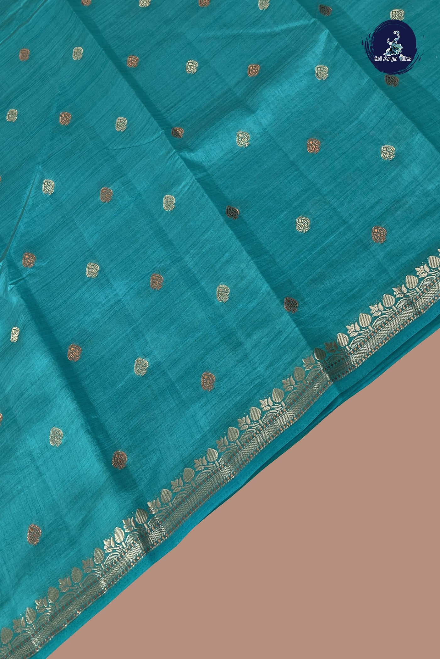 Turquoise Semi Tussar Saree With Zari Buttas Pattern