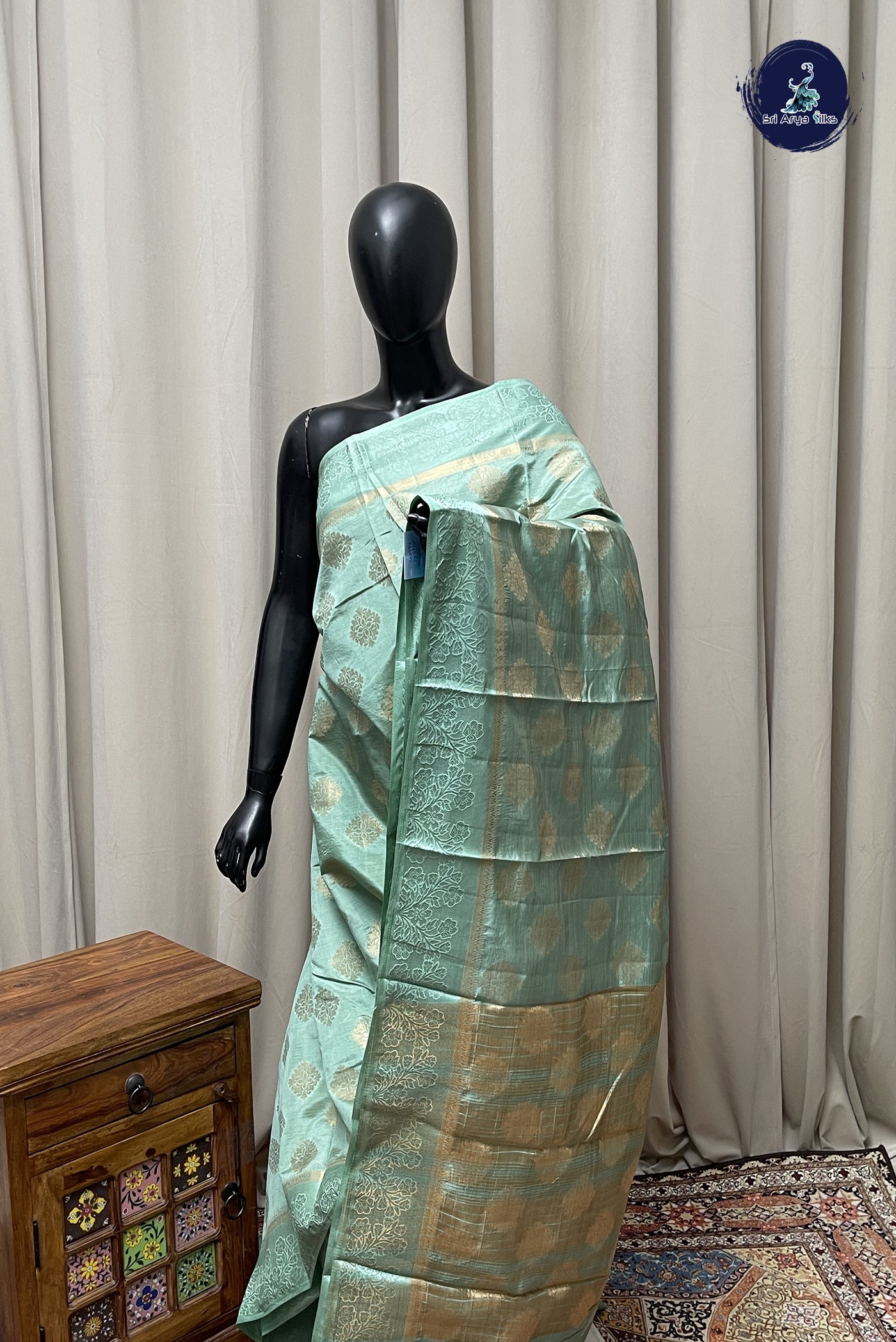 Pastel Green Semi Tussar Saree With Zari Buttas Pattern