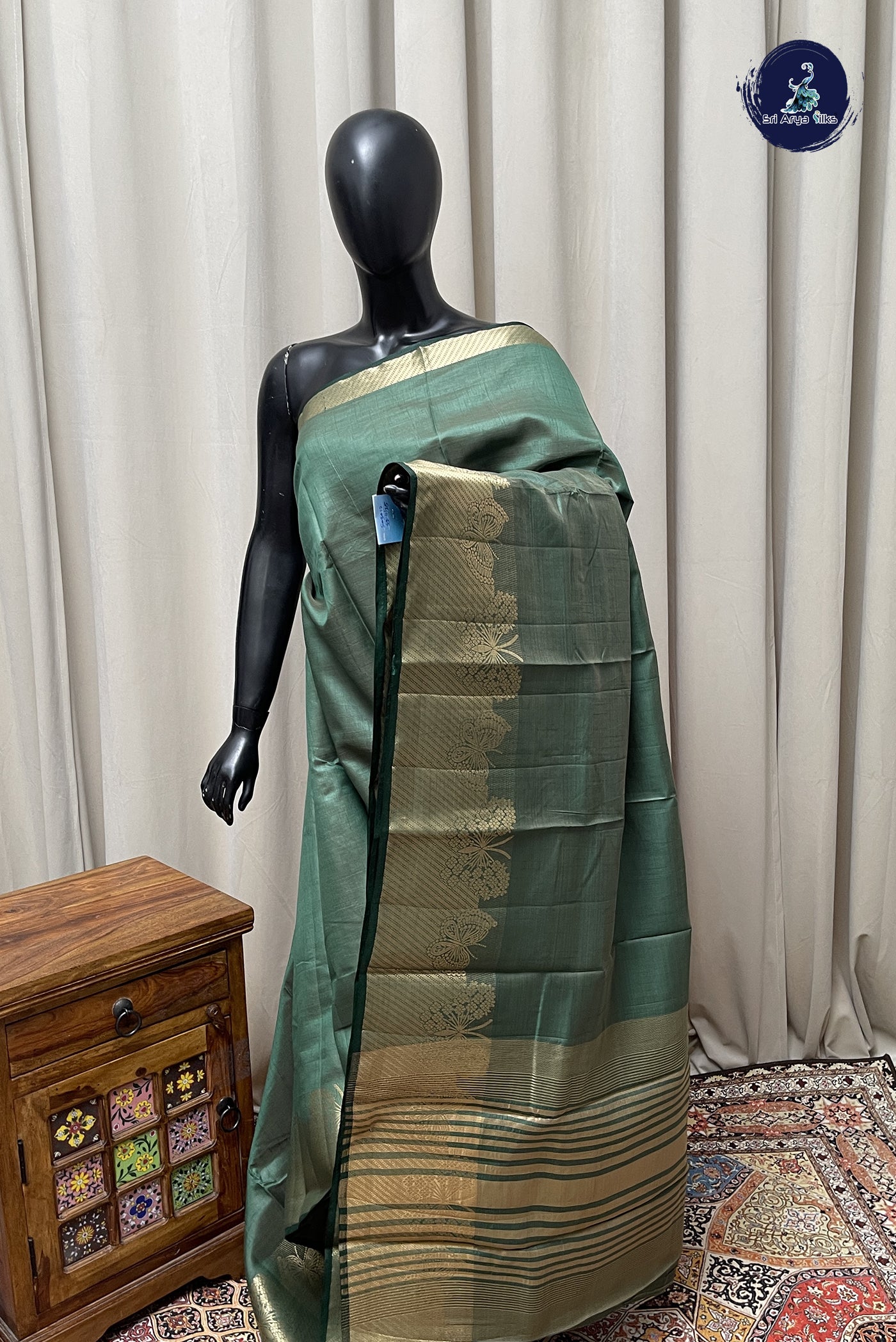Dark Green Semi Tussar Saree With Plain Pattern