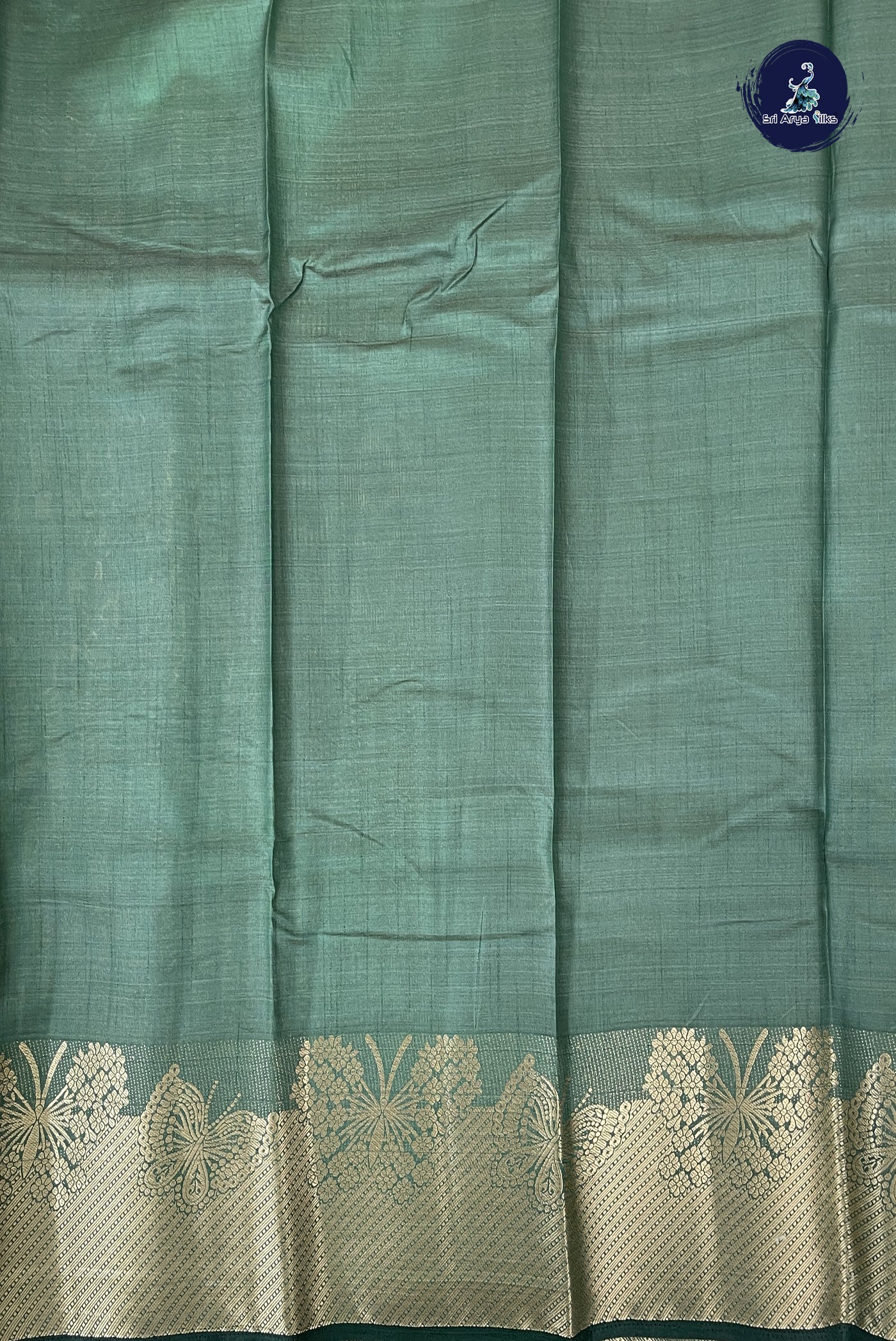 Dark Green Semi Tussar Saree With Plain Pattern