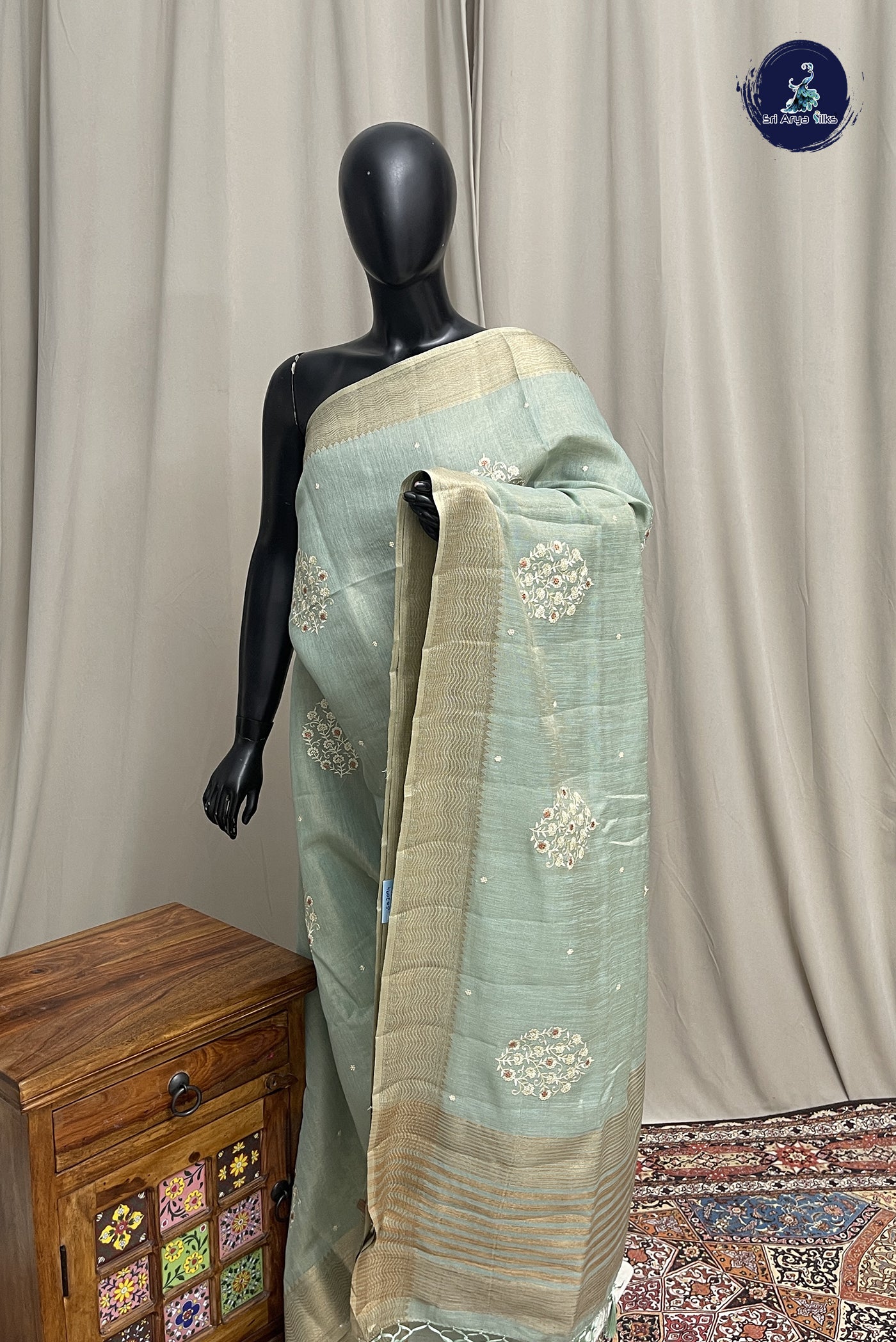 Pastel Shade Linen Saree With Embroidery Pattern