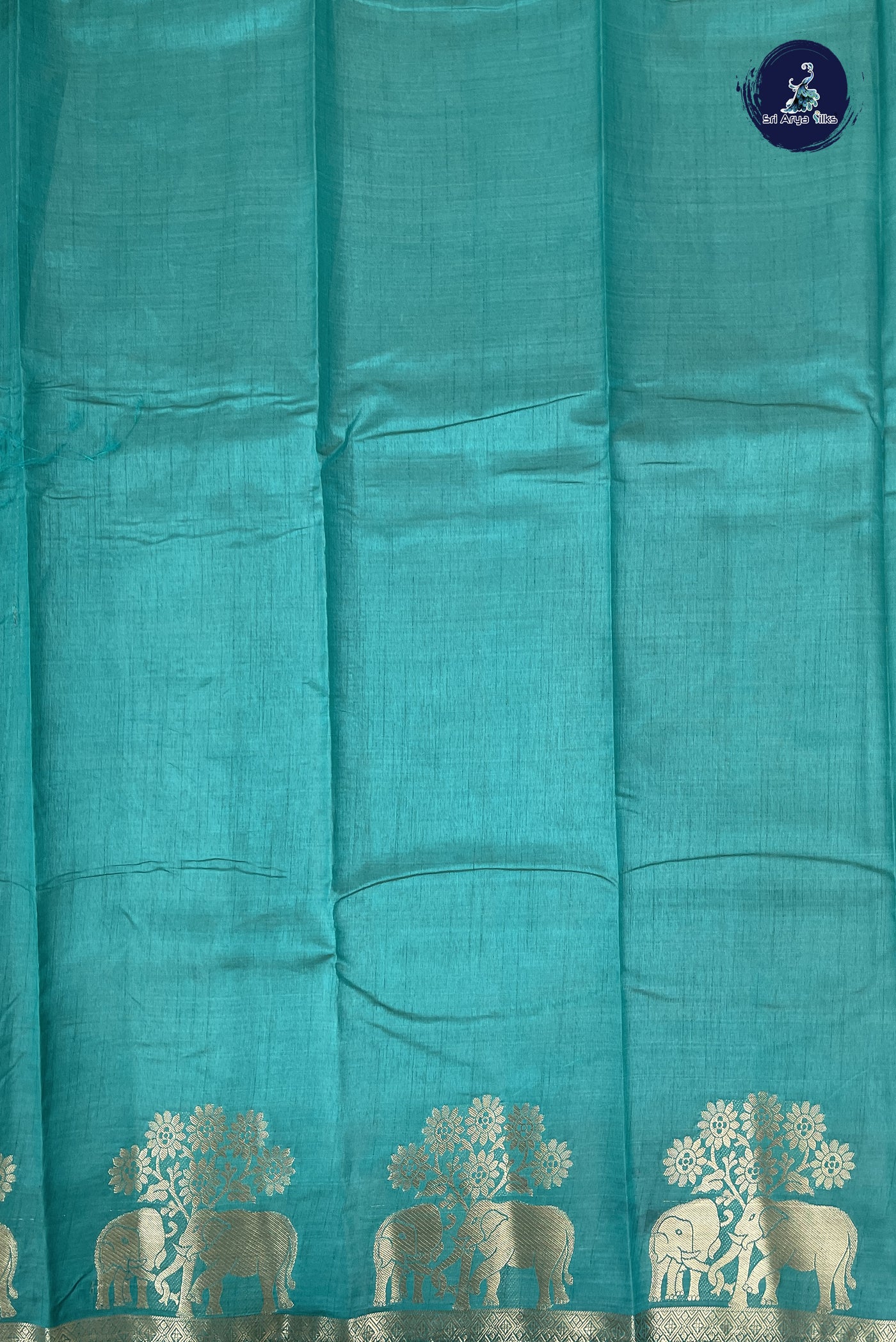 Teal Semi Tussar Saree With Plain Pattern