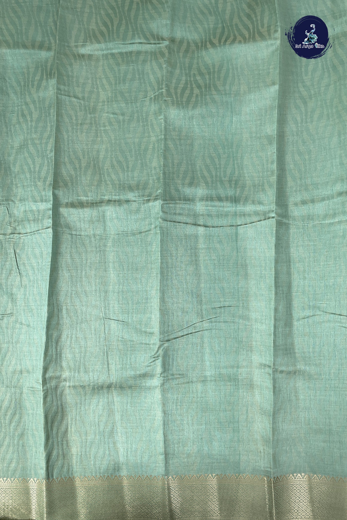 Pastel Green Semi Tussar Saree With Embossed Pattern