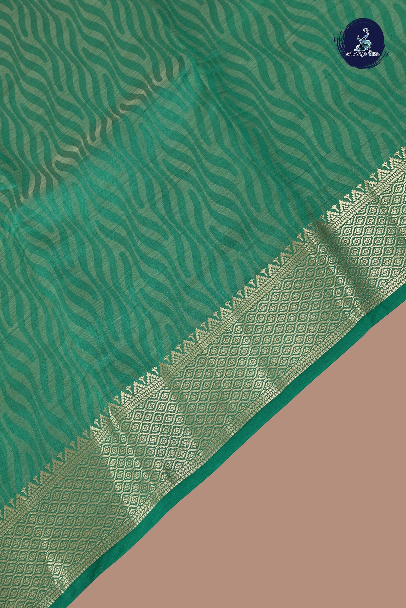 Green Semi Tussar Saree With Embossed Pattern