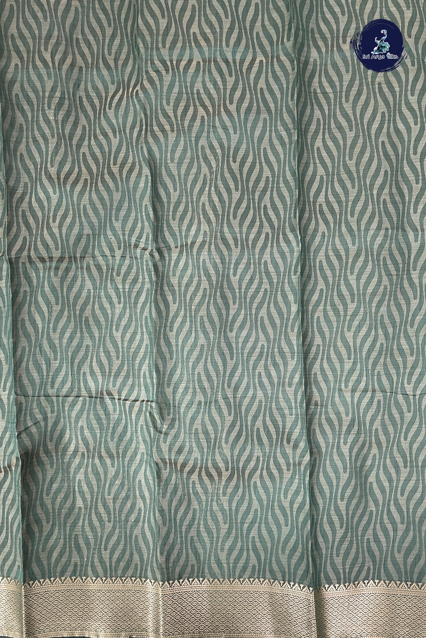 Dark Green Semi Tussar Saree With Embossed Pattern