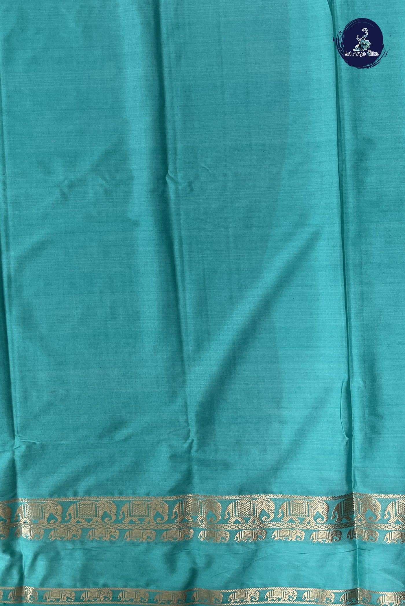 Dark Green Semi Mysore Silk With Plain Pattern