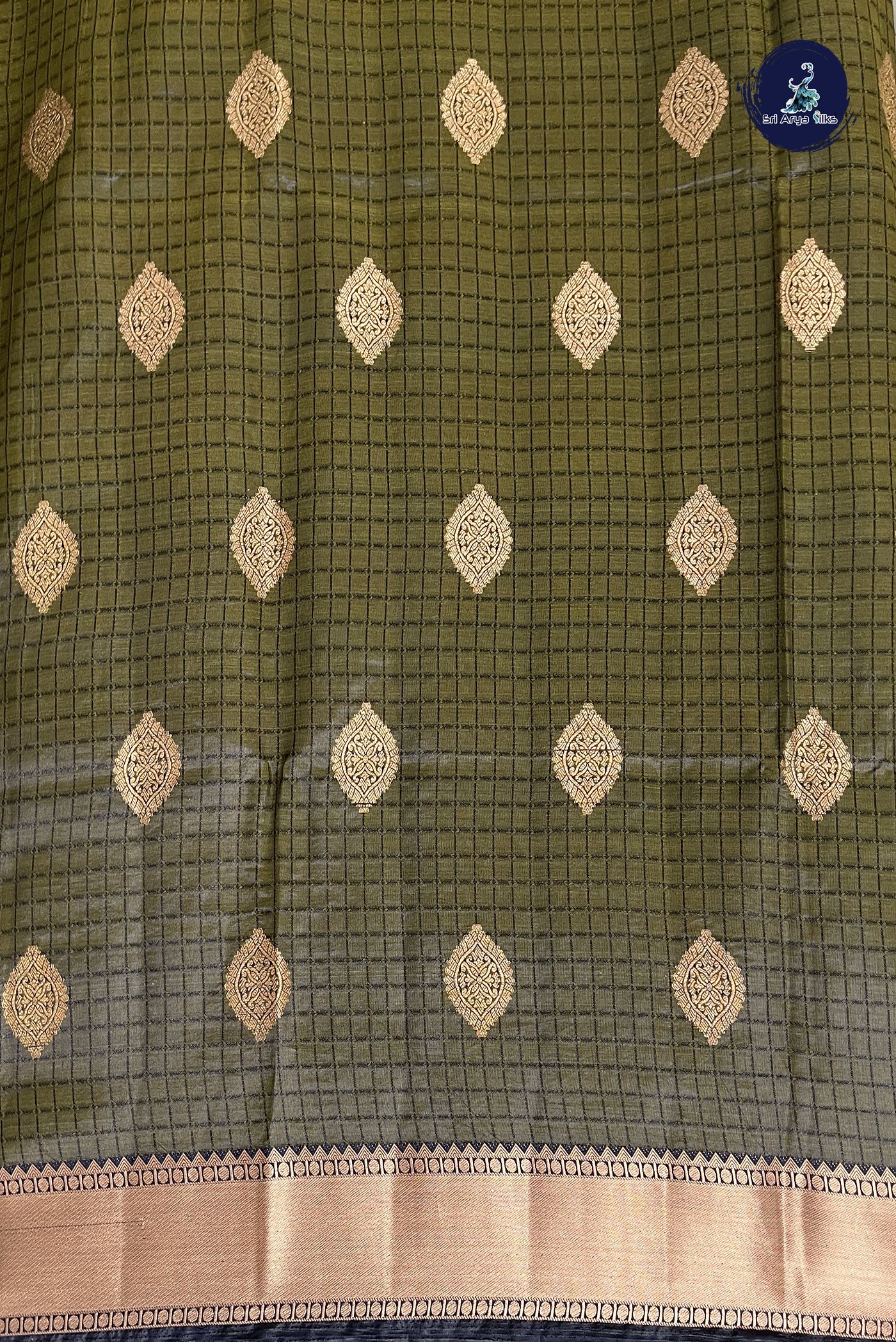 Dark Green Semi Tussar Saree With Zari Buttas Pattern