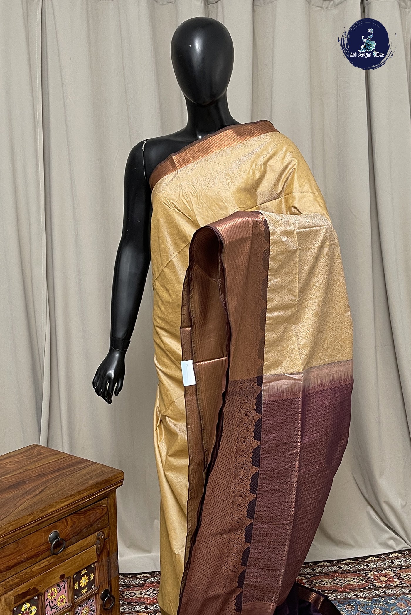 Creamish Yellow Semi Silk Saree With Embossed Pattern