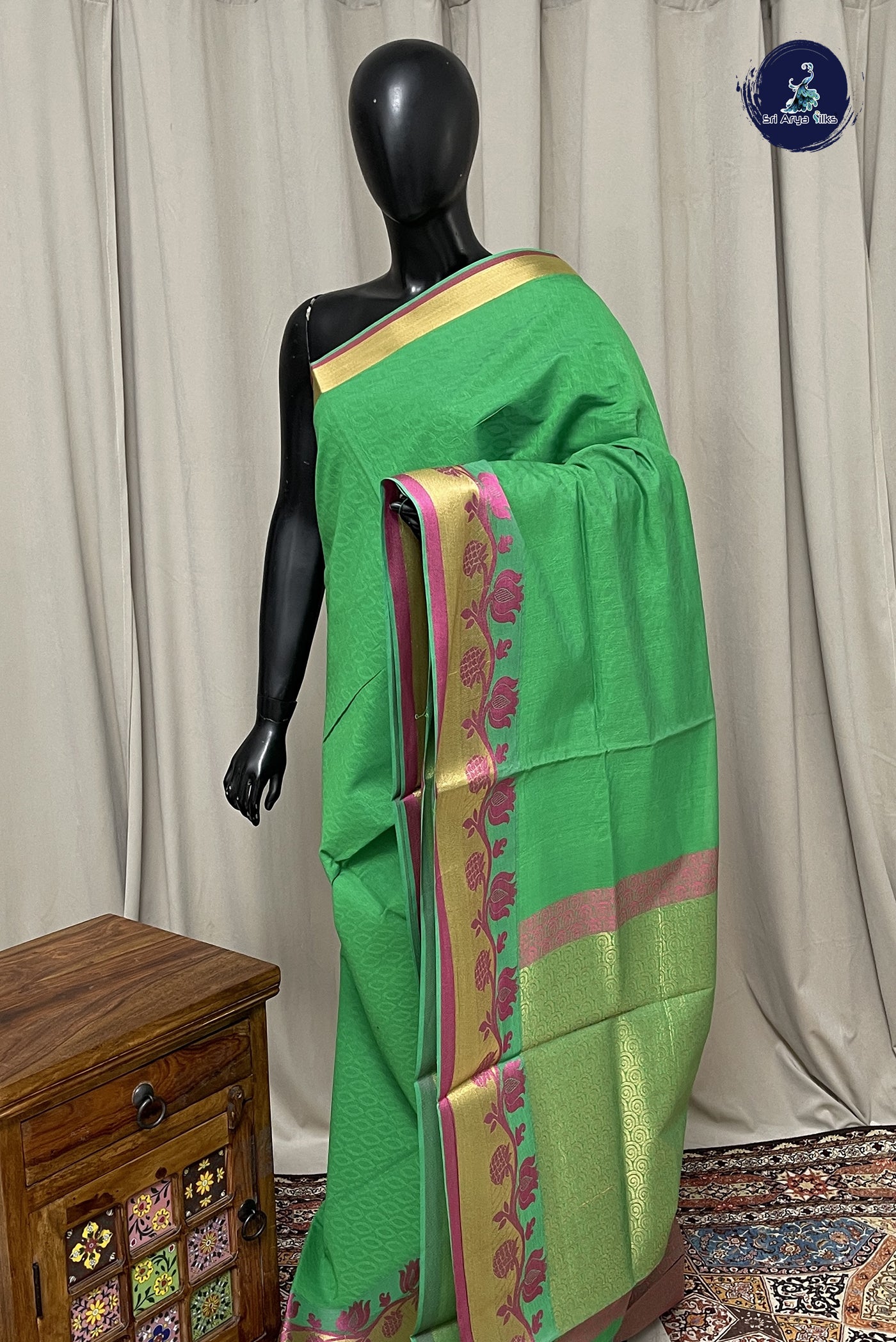 Parrot Green Cotton Saree With Embossed Pattern
