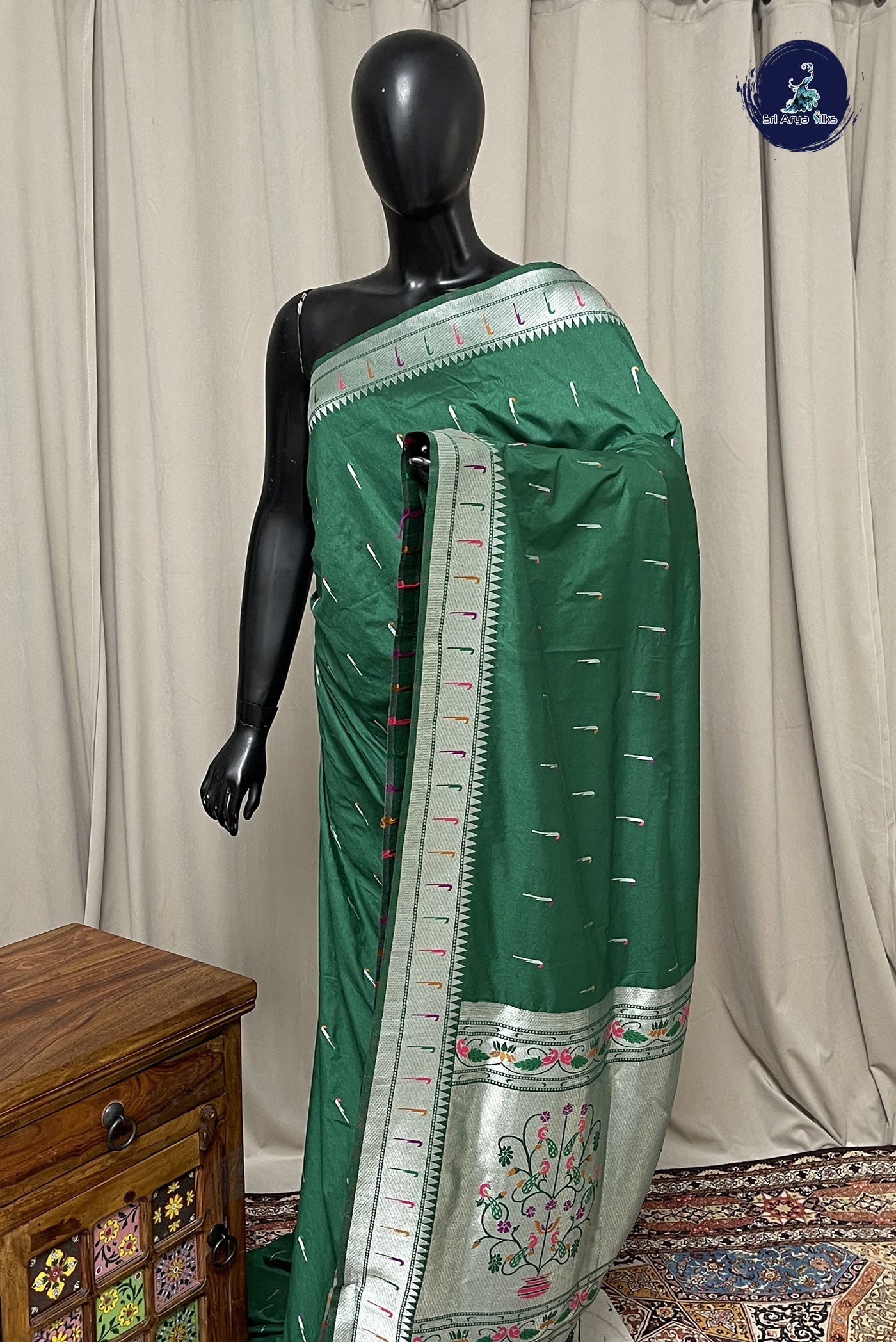 Dark Green Semi Raw Silk Saree With Embossed Pattern