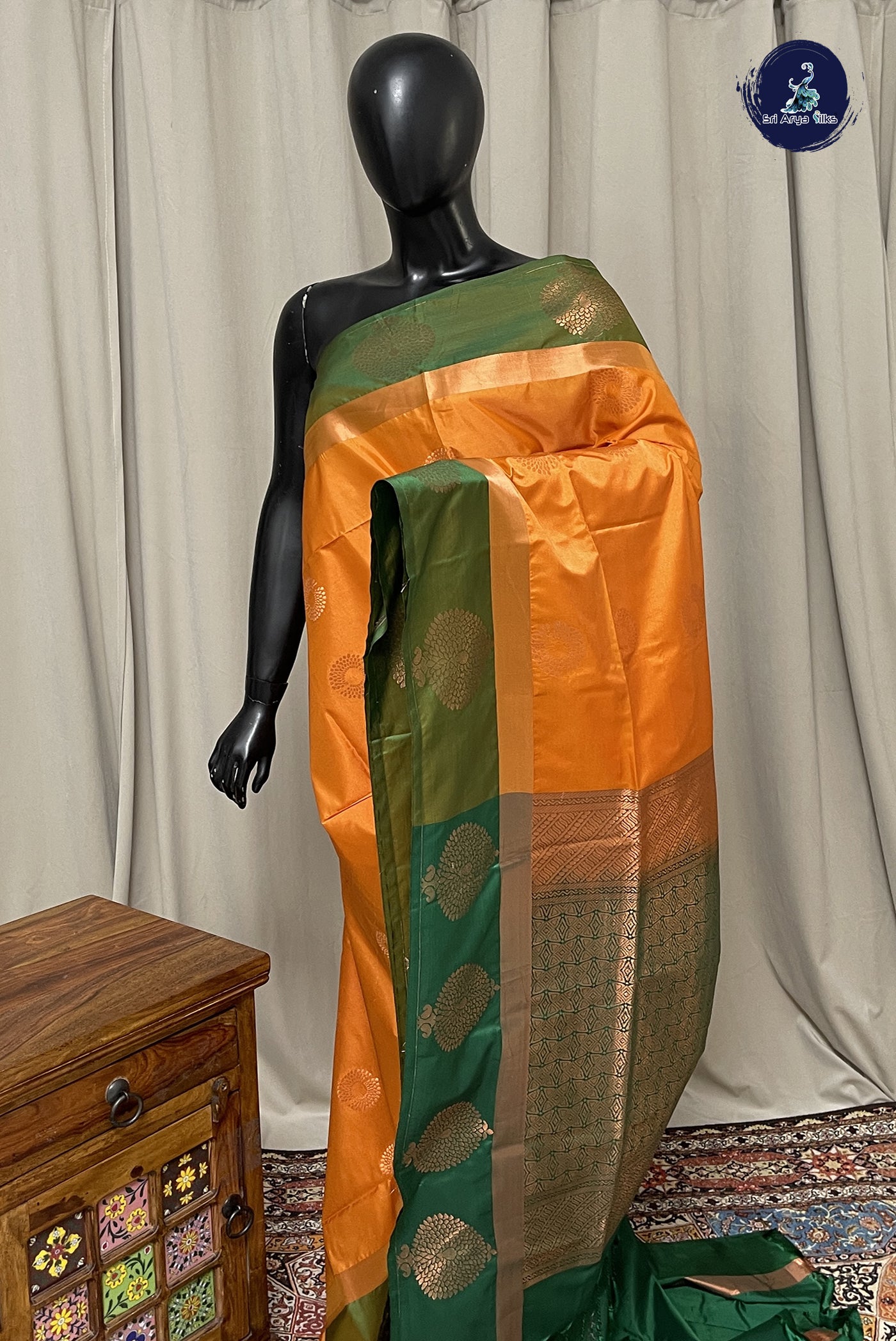 Lite Mustard Orange Semi Silk Saree With Zari Buttas Pattern