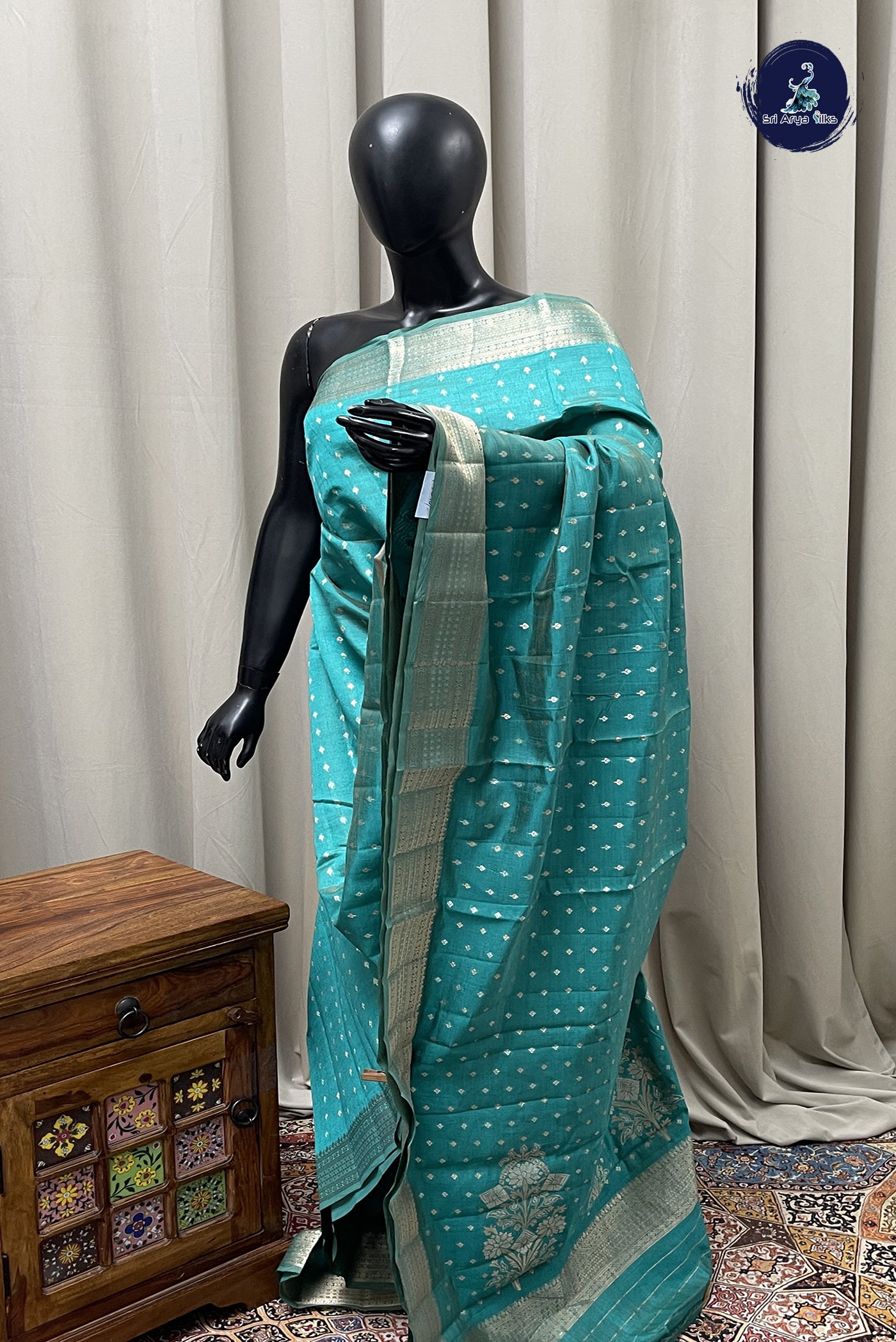 Teal Semi Tussar Saree With Zari Buttas Pattern