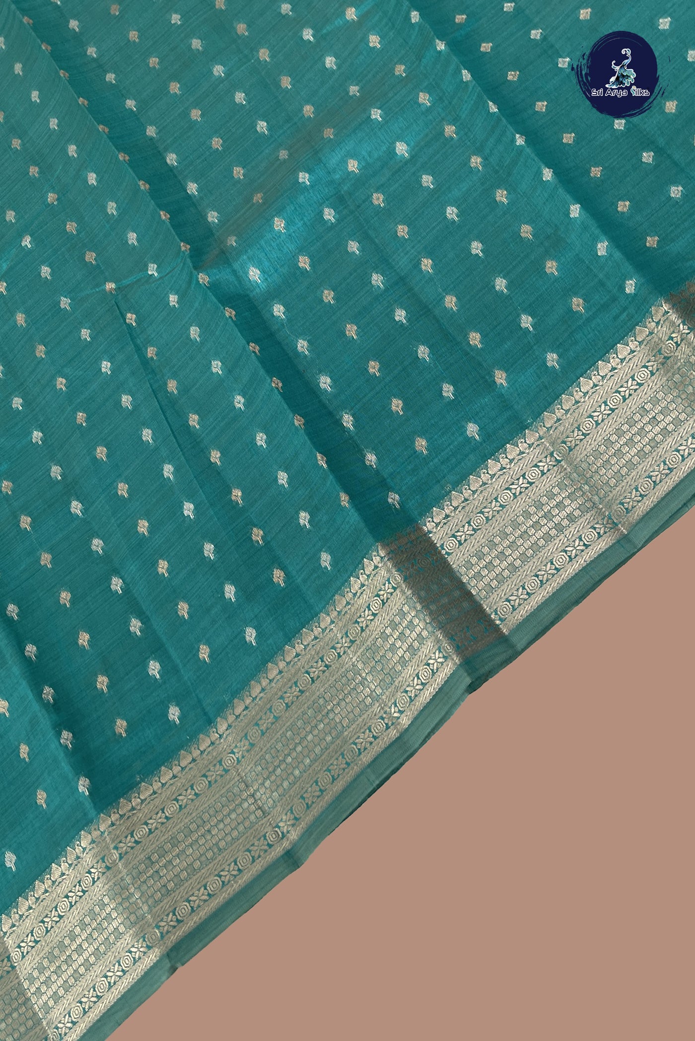 Teal Semi Tussar Saree With Zari Buttas Pattern